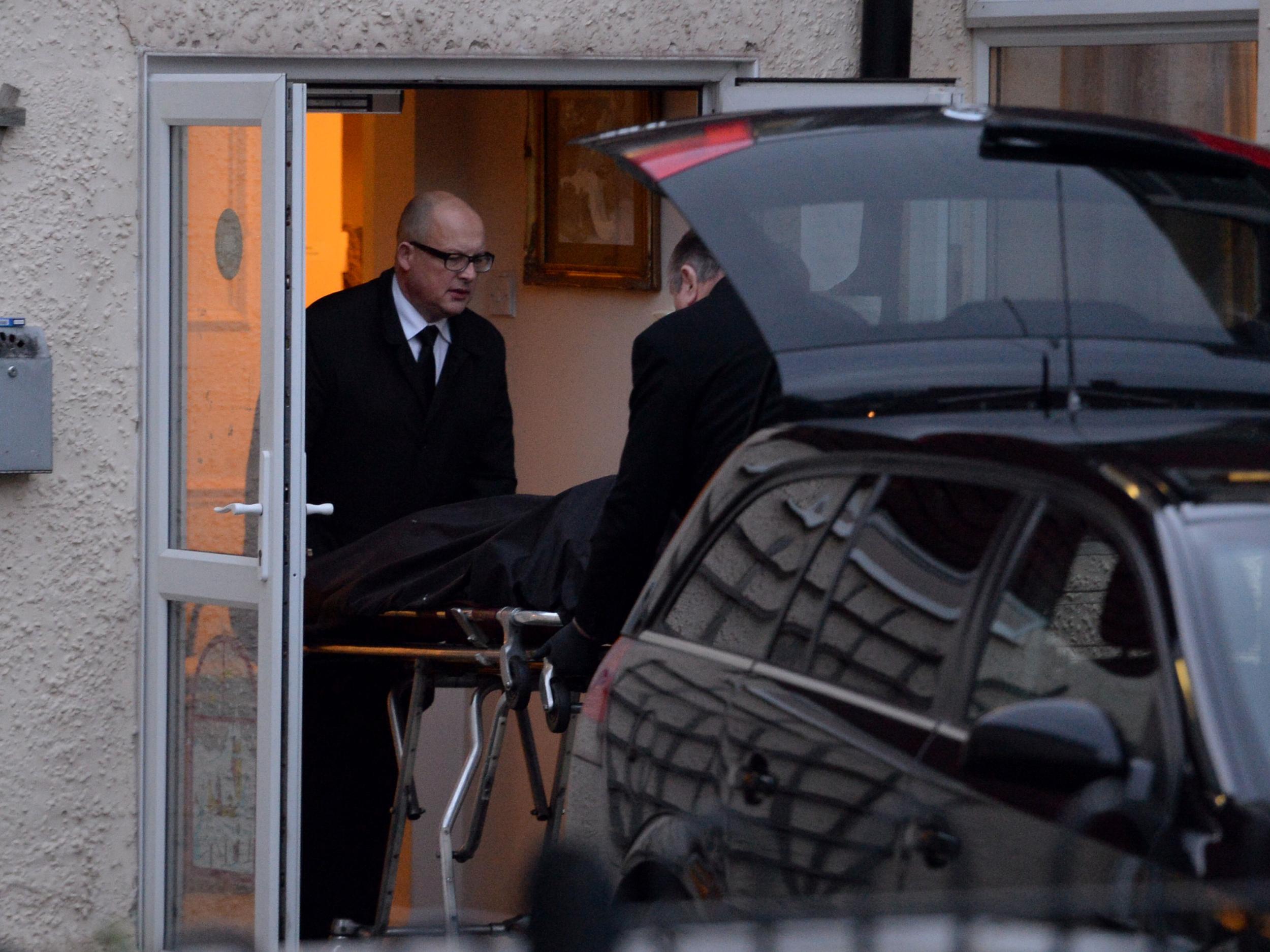 A body is removed from De La Mer House in Walton-on-the-Naze, Essex