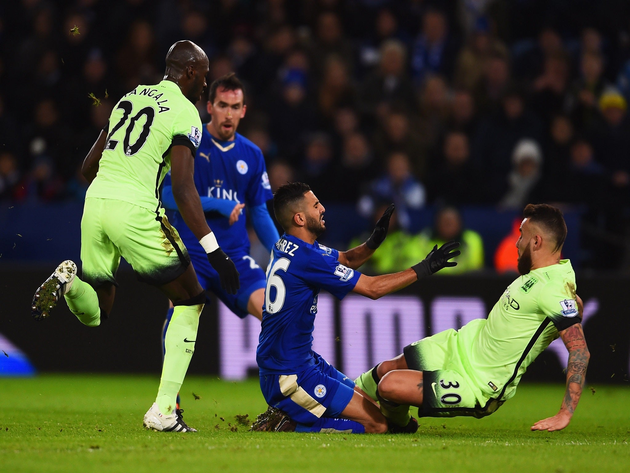 Nicolas Otamendi and Eliaquim Mangala close in on Riyad Mahrez