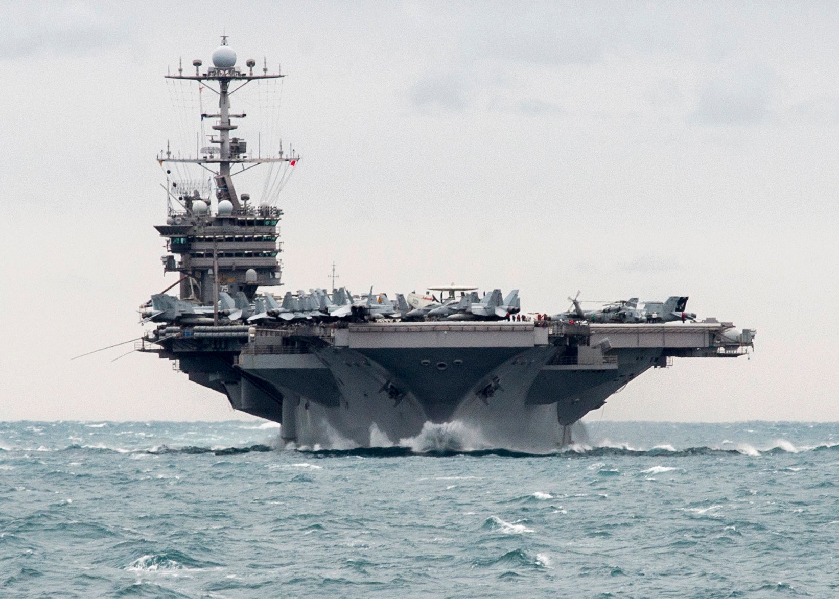 USS Harry S. Truman transits the Strait of Hormuz.