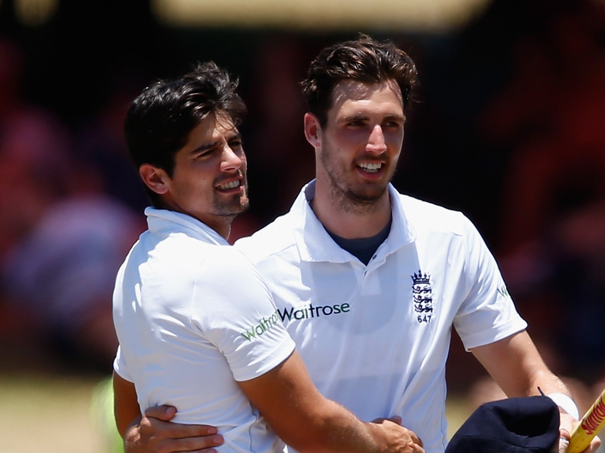 England captain Alastair Cook celebrates with Steven Finn