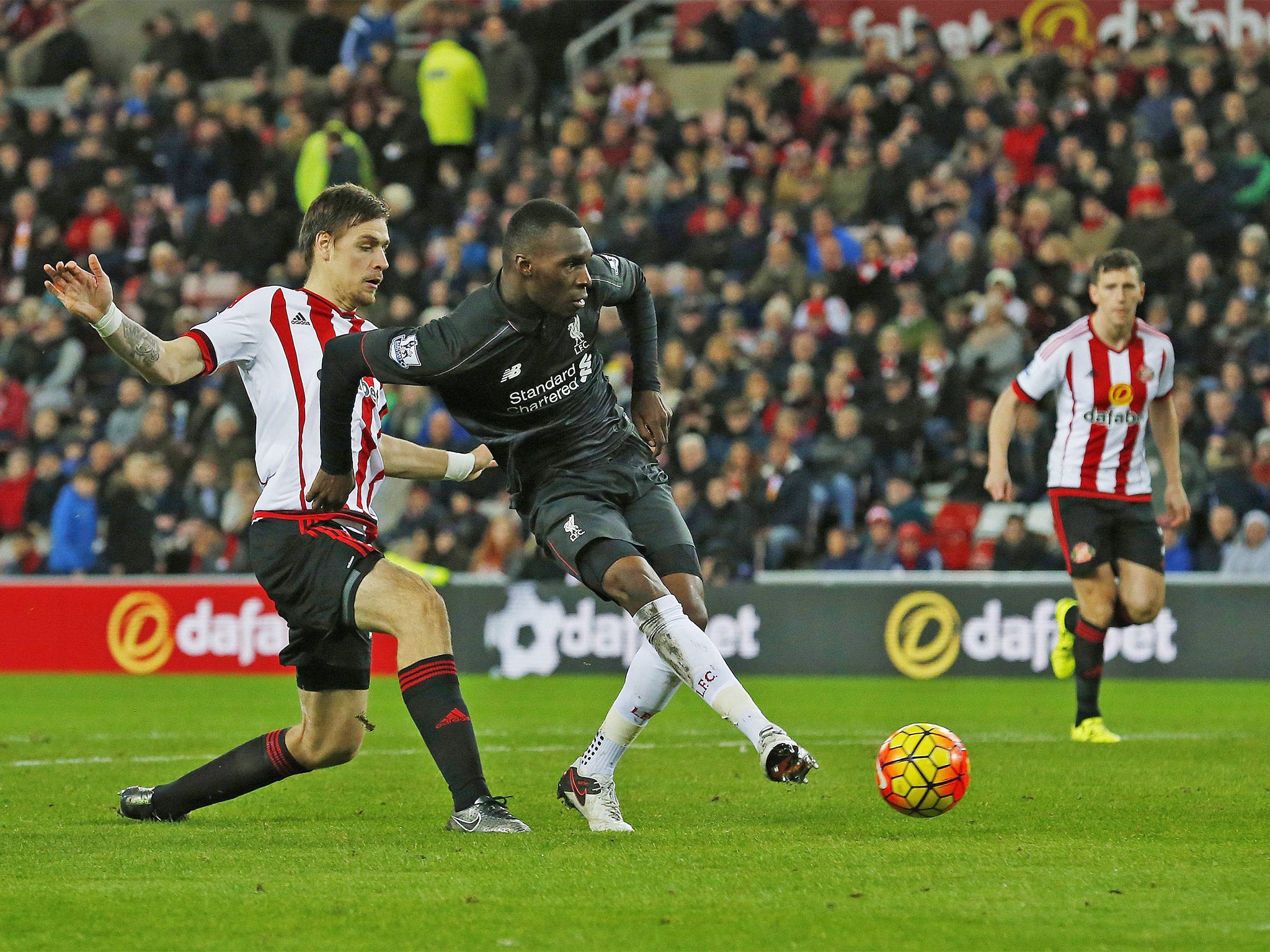 Christian Benteke cooly slots in to give Liverpool the lead