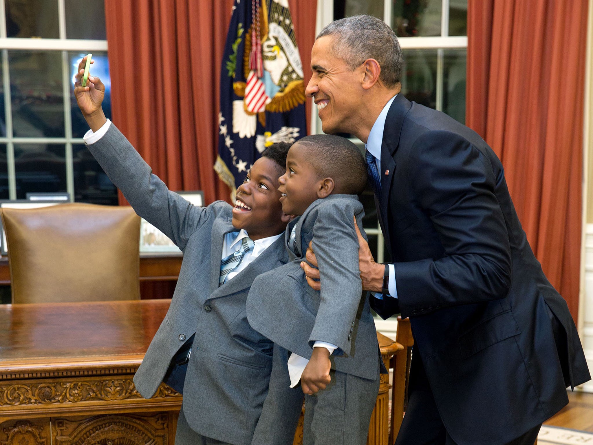 Dec. 4, 2015
“The President acquiesced to a selfie with 11-year-old Jacob Haynes and four-year-old James Haynes after taking a family photograph with departing White House staffer Heather Foster.”