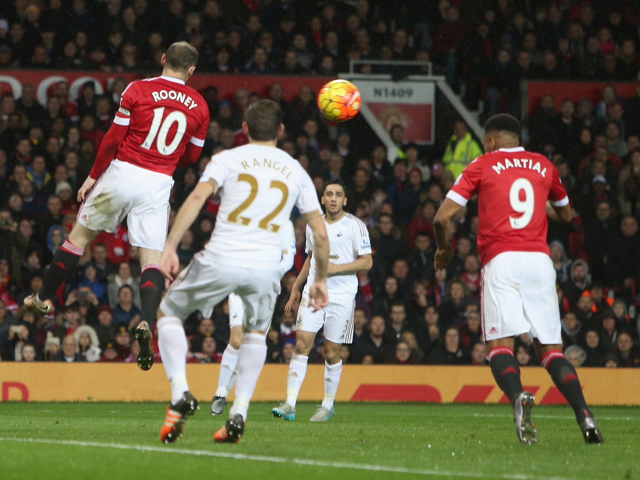 Anthony Martial heads to open the scoring against Swansea