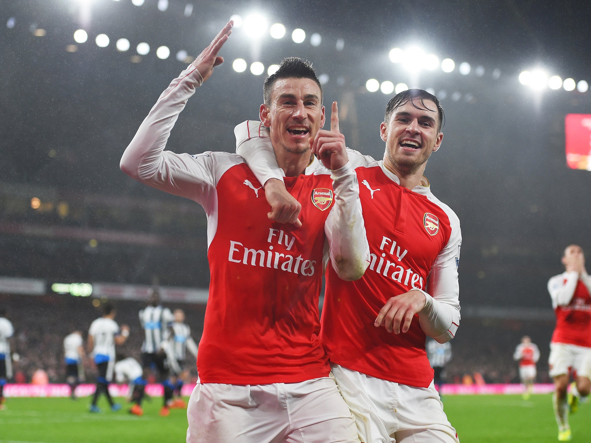 Laurent Koscielny celebrates his goal with Aaron Ramsey