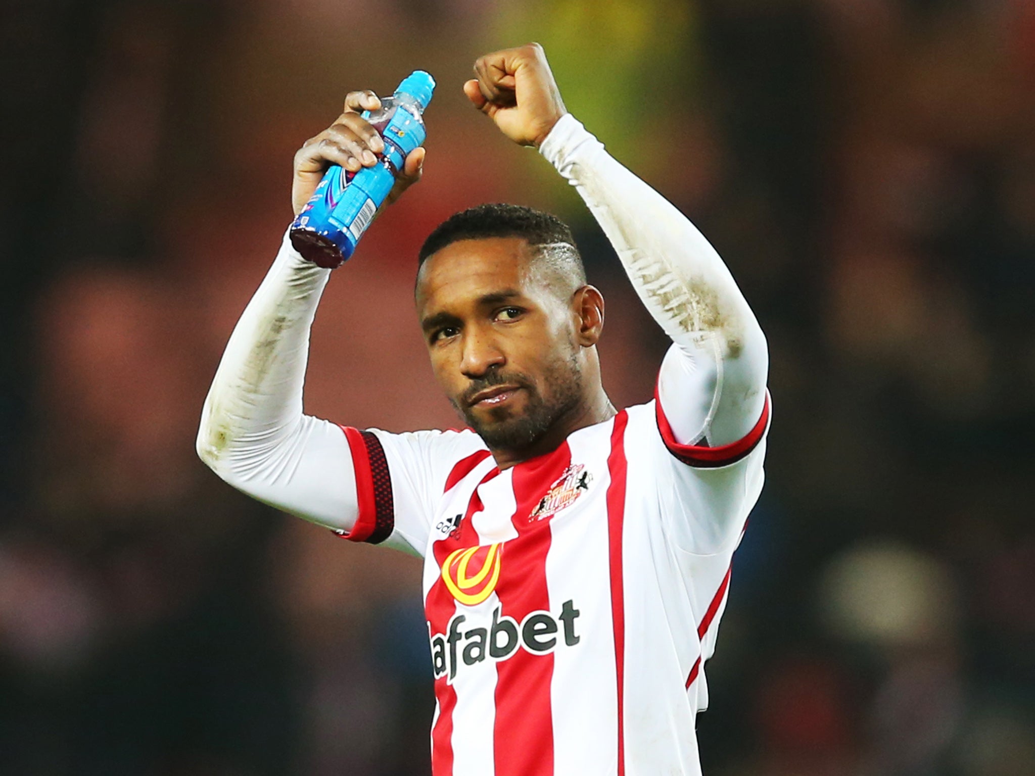 Jermain Defoe thanks the crowd after his match-winning performance