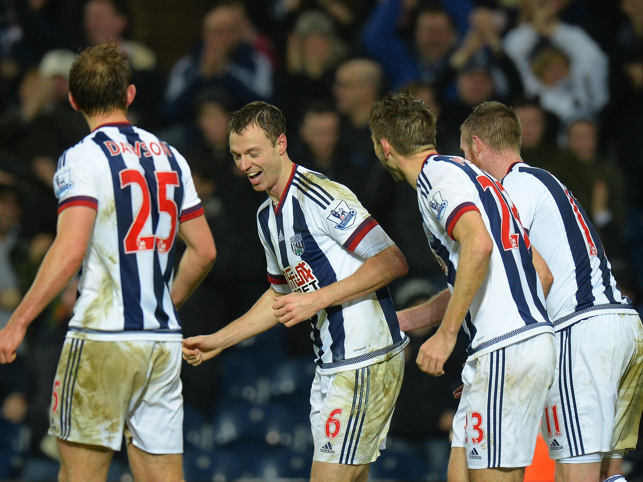 Jonny Evans celebrates his late winner