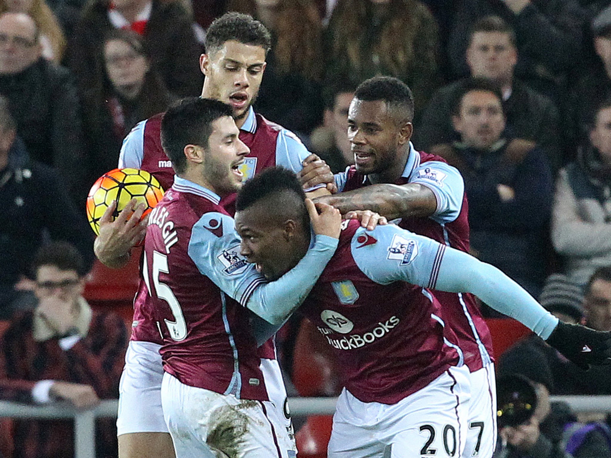 Aston Villa's players celebrate their equaliser