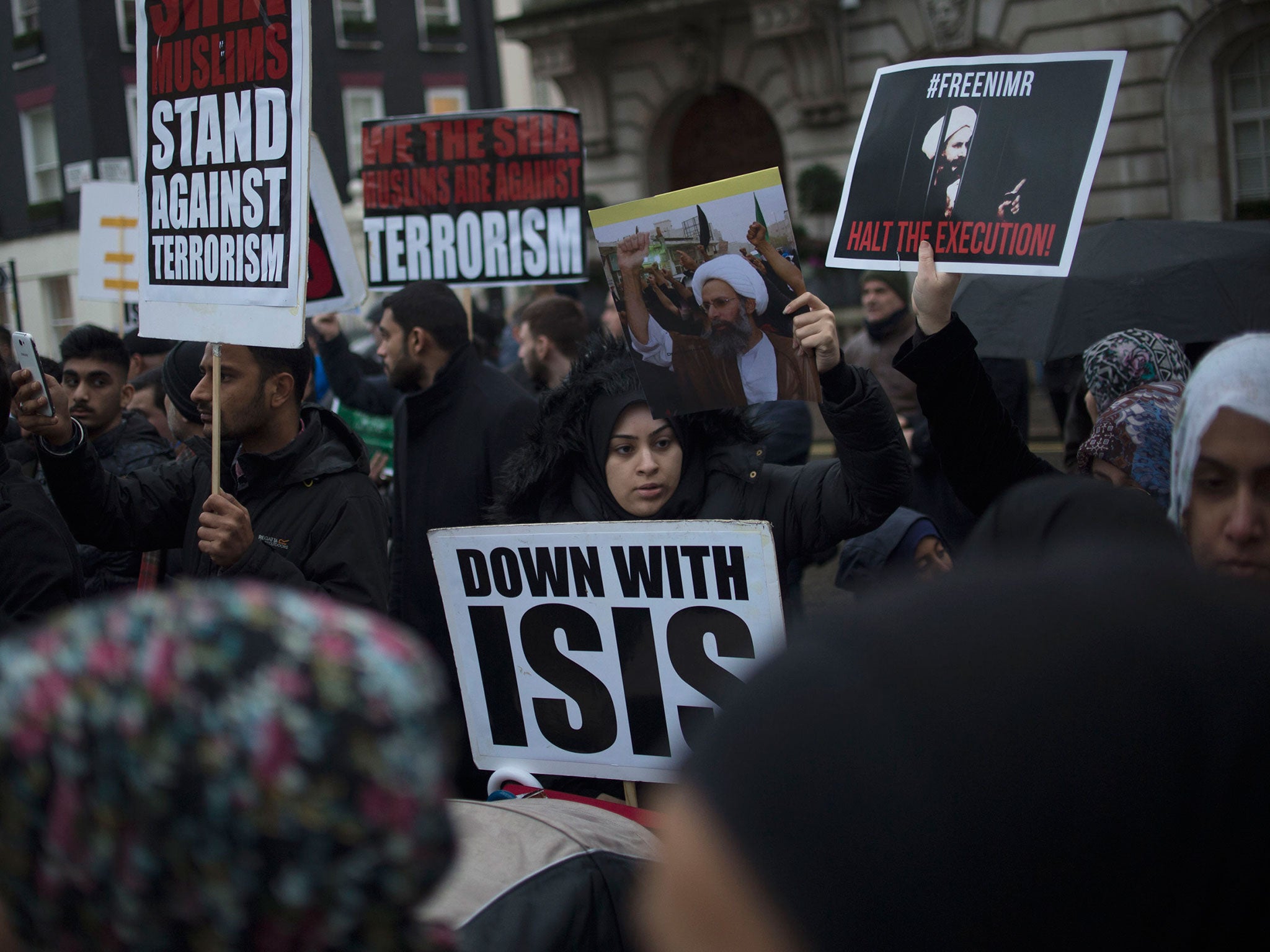 Demonstrators protest outside the Saudi Embassy in London, following Saudi Arabia's execution of 47 prisoners in one day