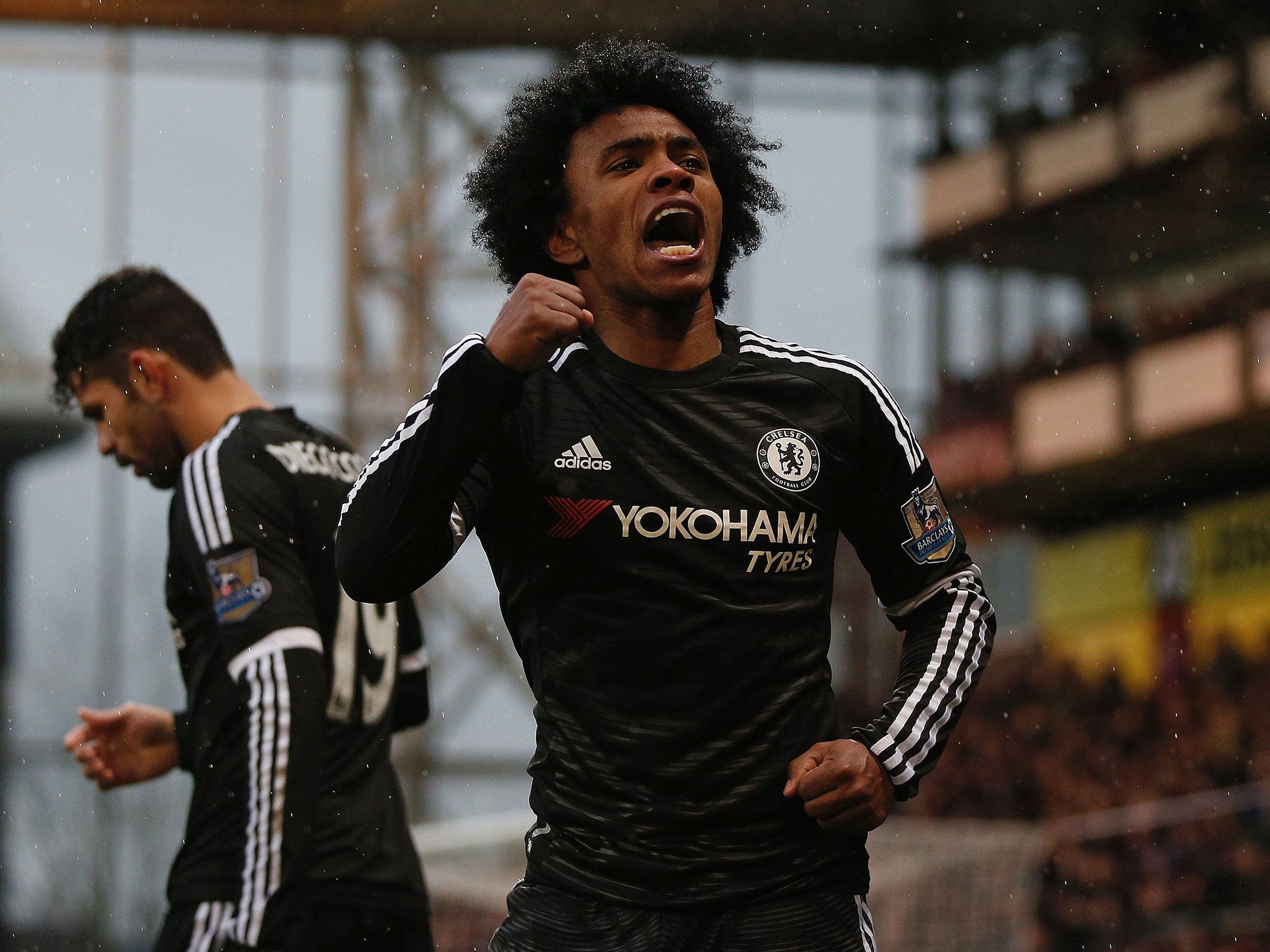 &#13;
Willian celebrates his strike against Crystal Palace&#13;