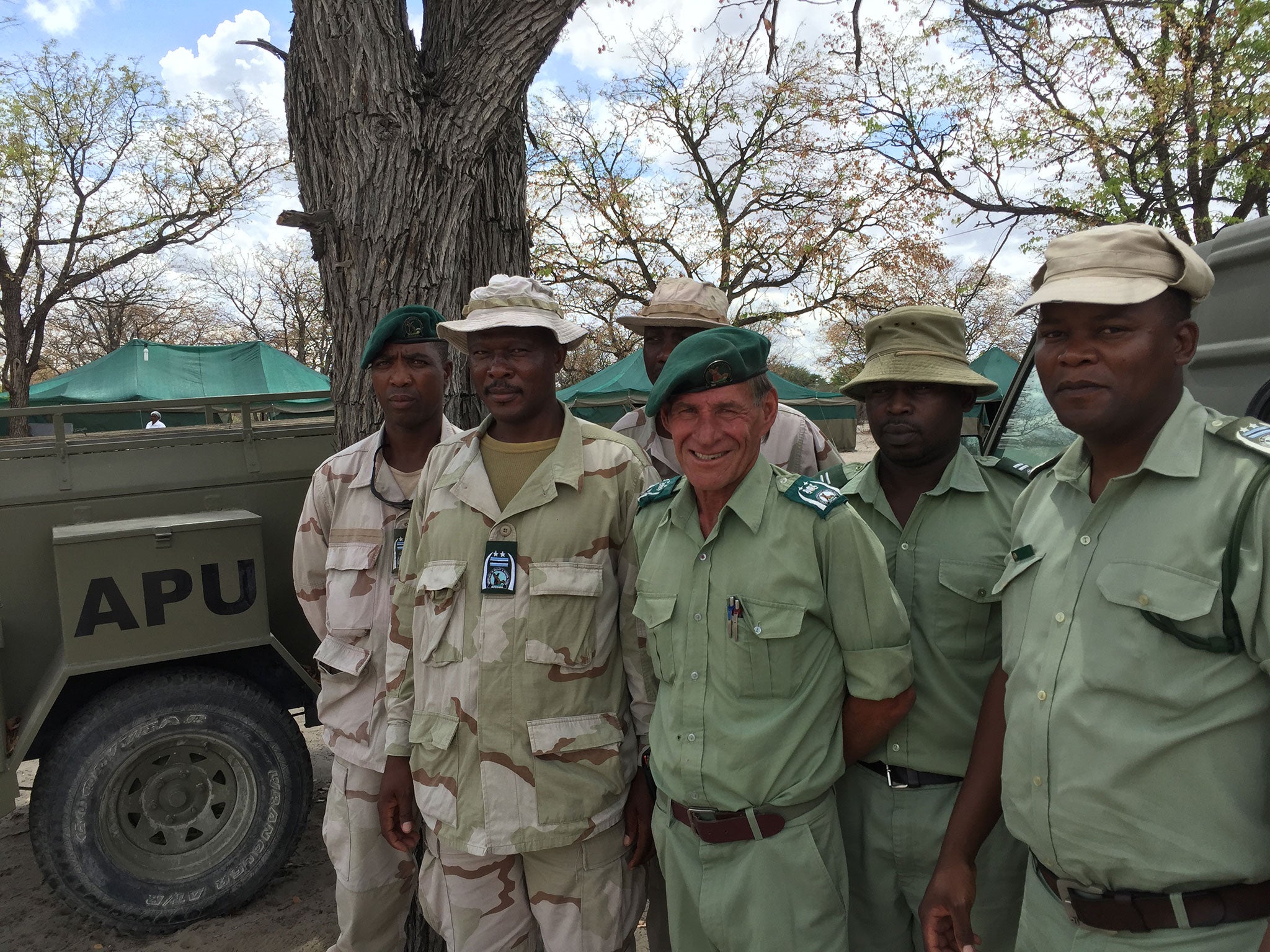 Members of Botswana’s antipoaching unit, with its new chief, Timothy Blackbeard, third right