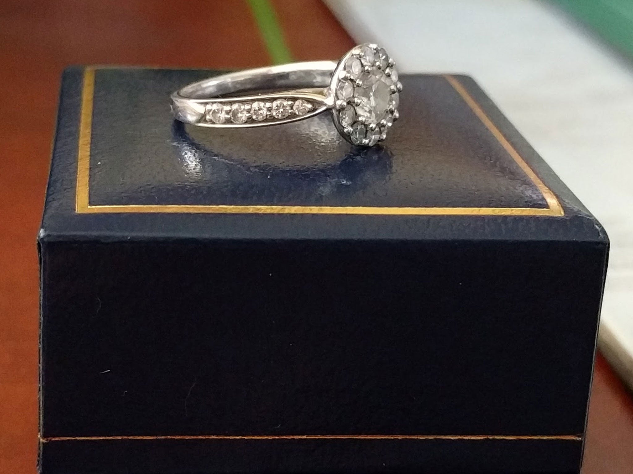 The ring is white gold or silver and features a circular diamond and further diamonds on the band. The owner has not disclosed how much it cost.