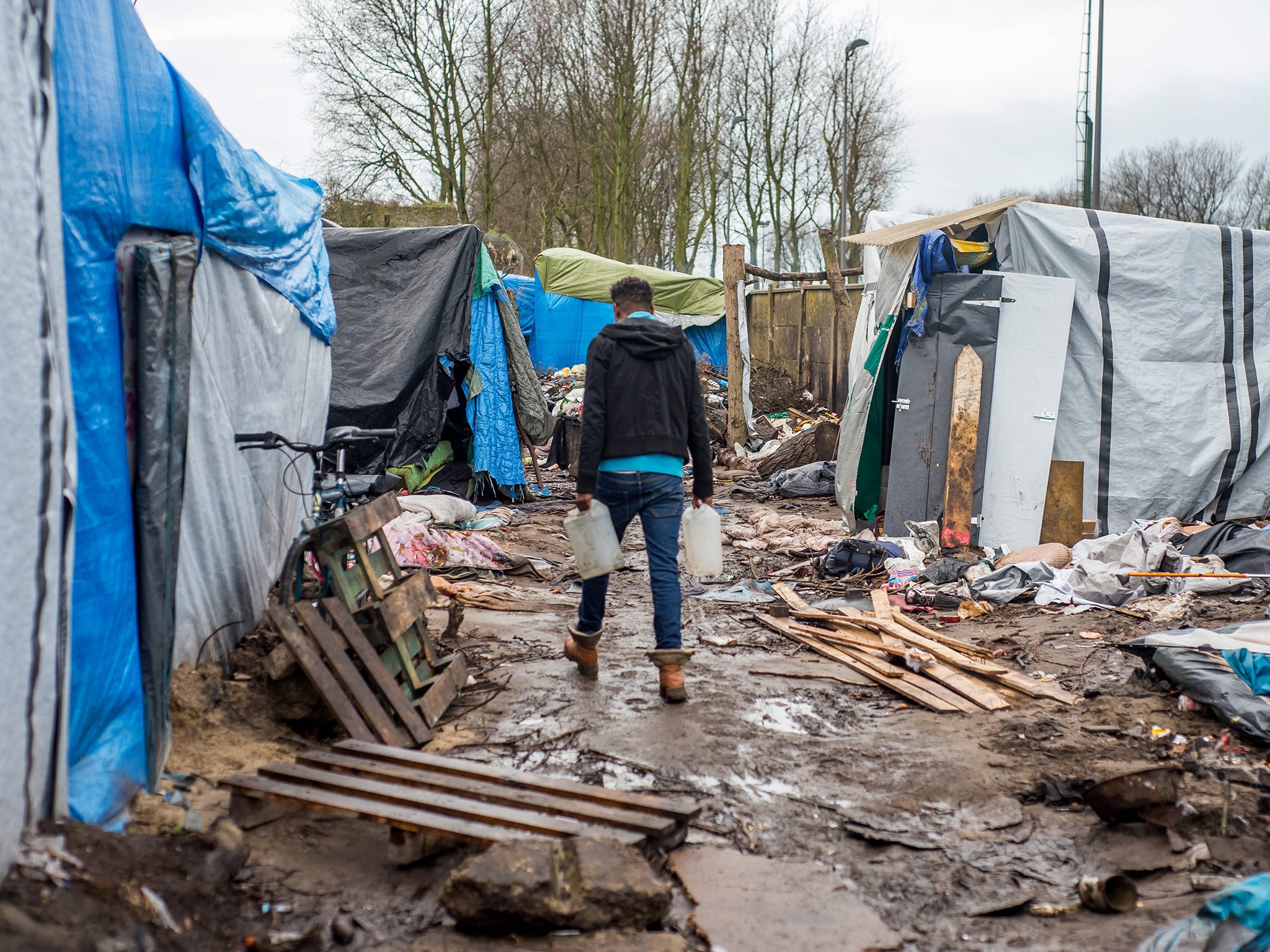 A refugee in the Calais Jungle on Christmas Day