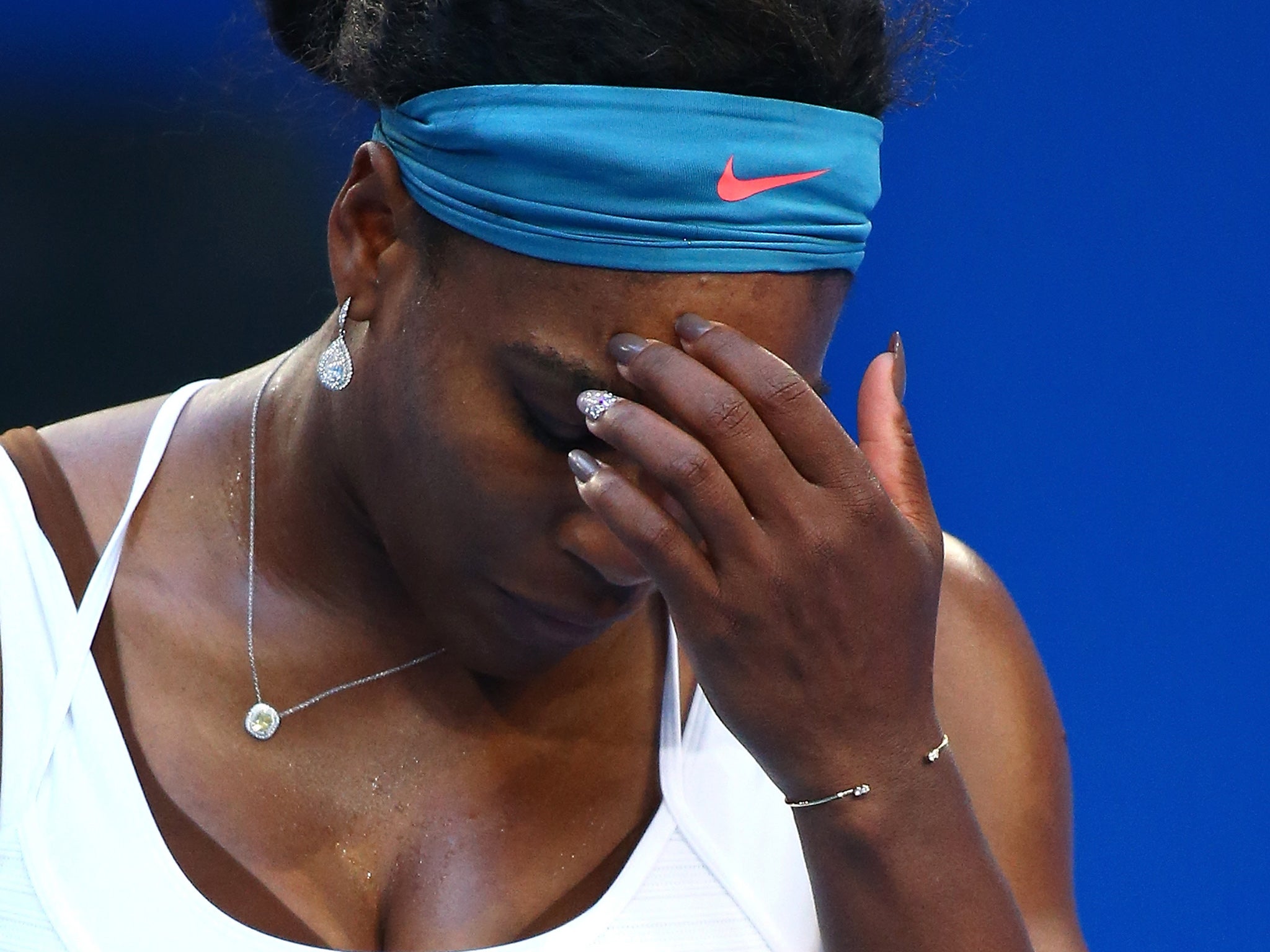 Serena Williams looks on during her singles match against Jarmila Wolfe