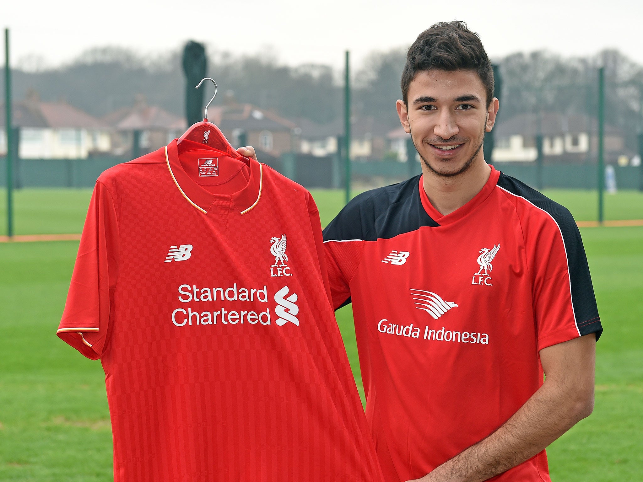 Marko Grujic shows hoff his new colours