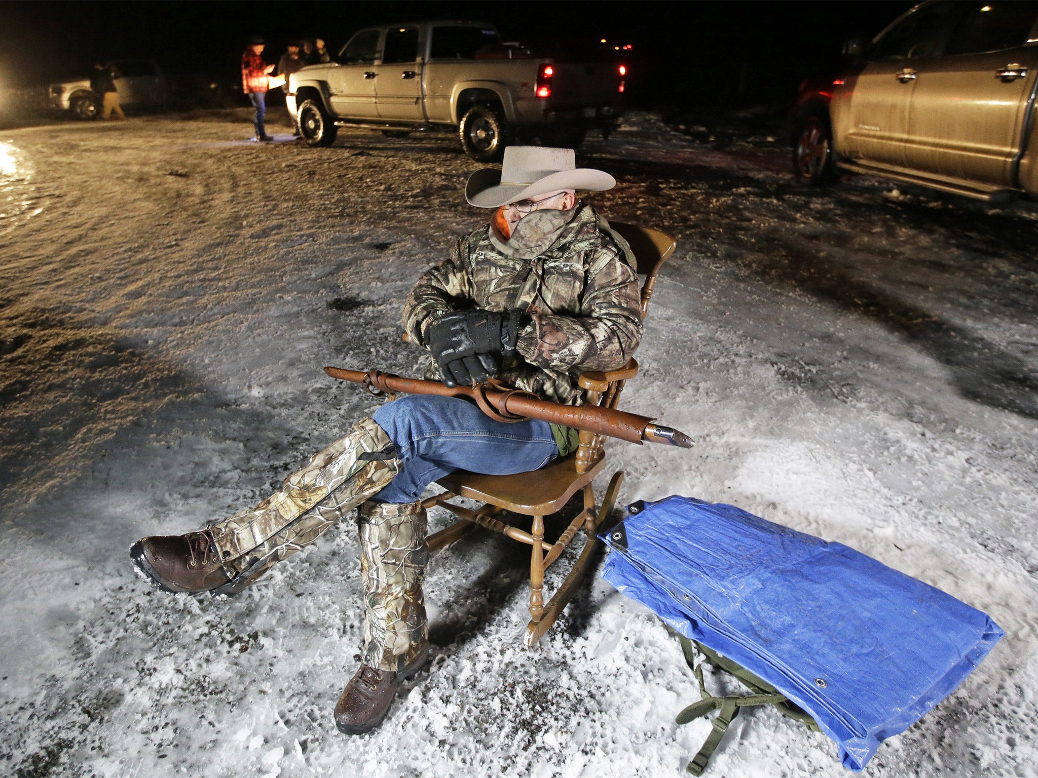 Landed sentry: Arizona rancher LaVoy Finicum keeps guard at the Malheur National Wildlife Refuge in Oregon