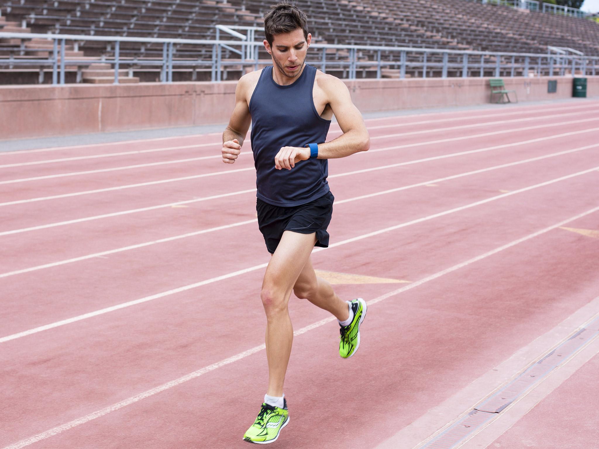 Fitness trackers monitor your steps around the running track