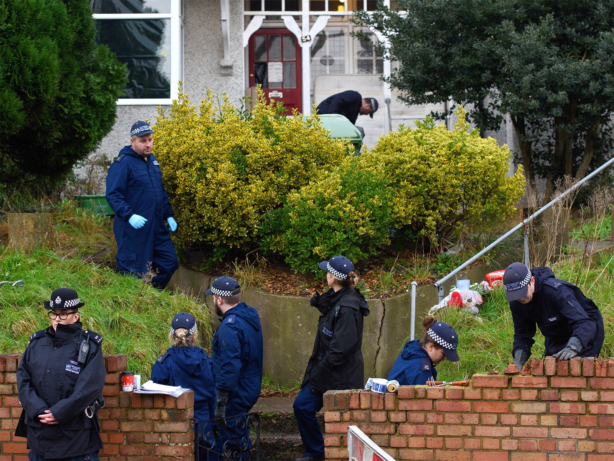 Police search the home in Erith, south-east London, where the bodies of actress Sian Blake and her two boys were discovered