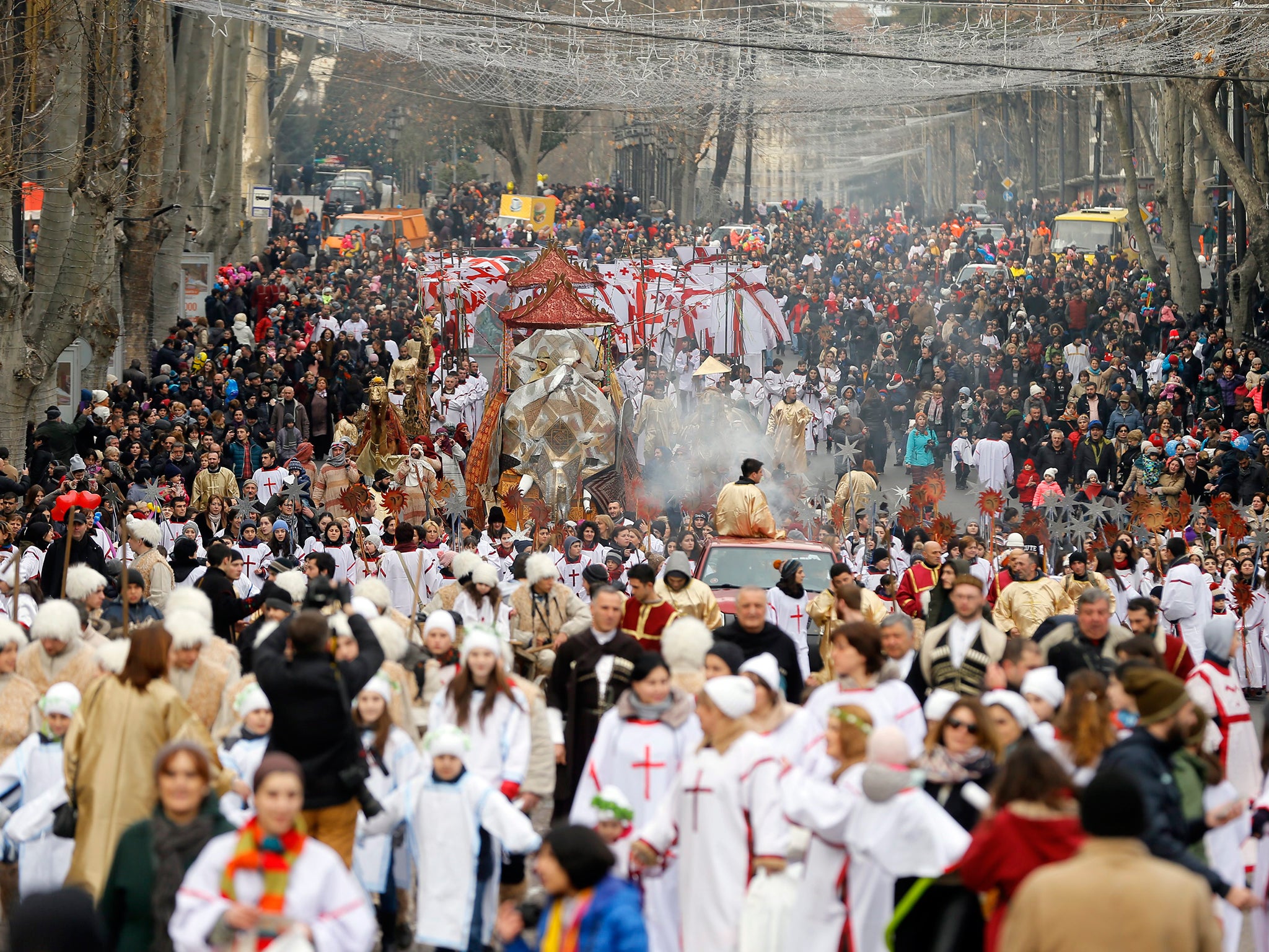 Georgians celebrate Christmas with a parade through the street