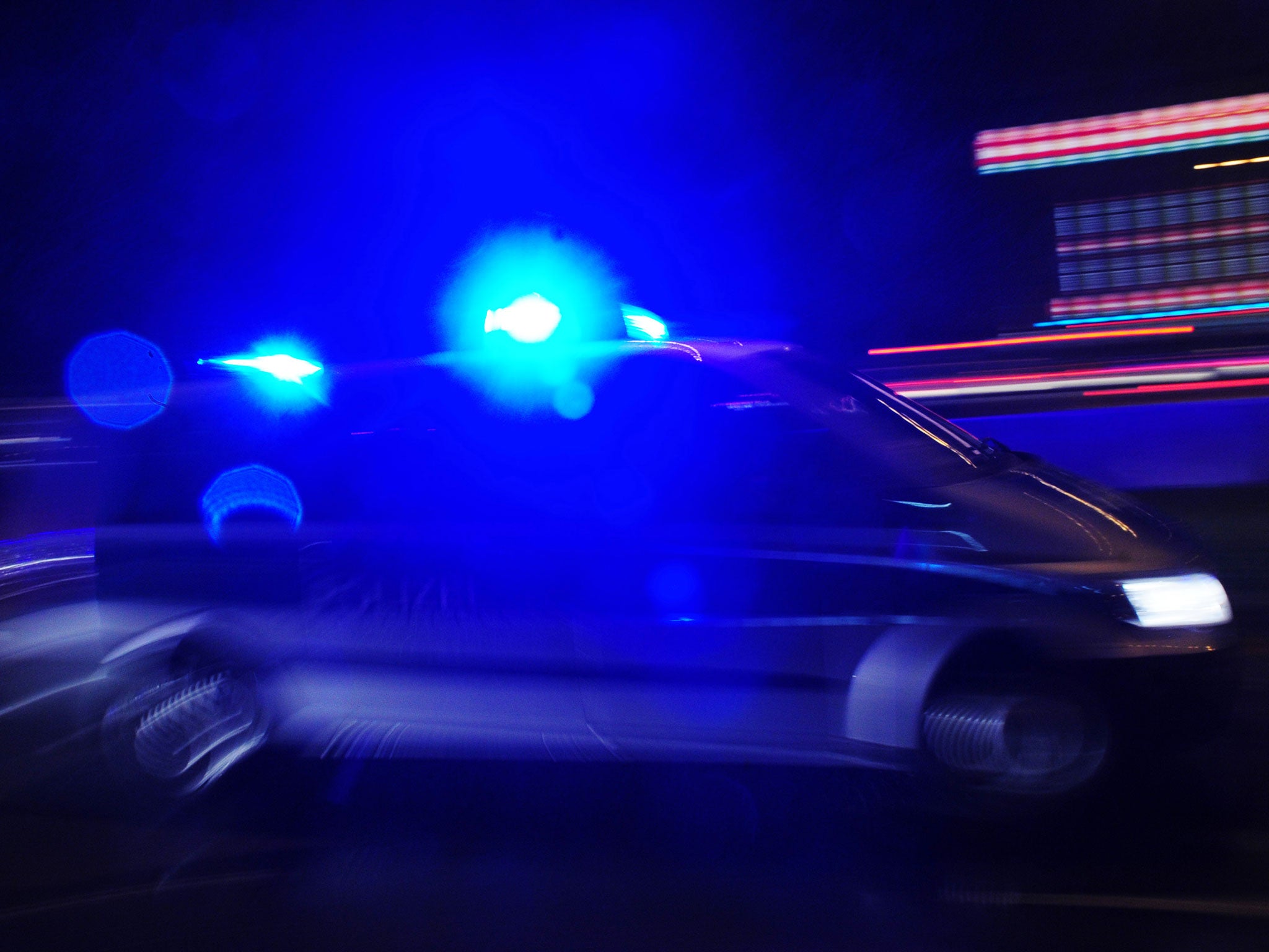 A police car with lights flashing