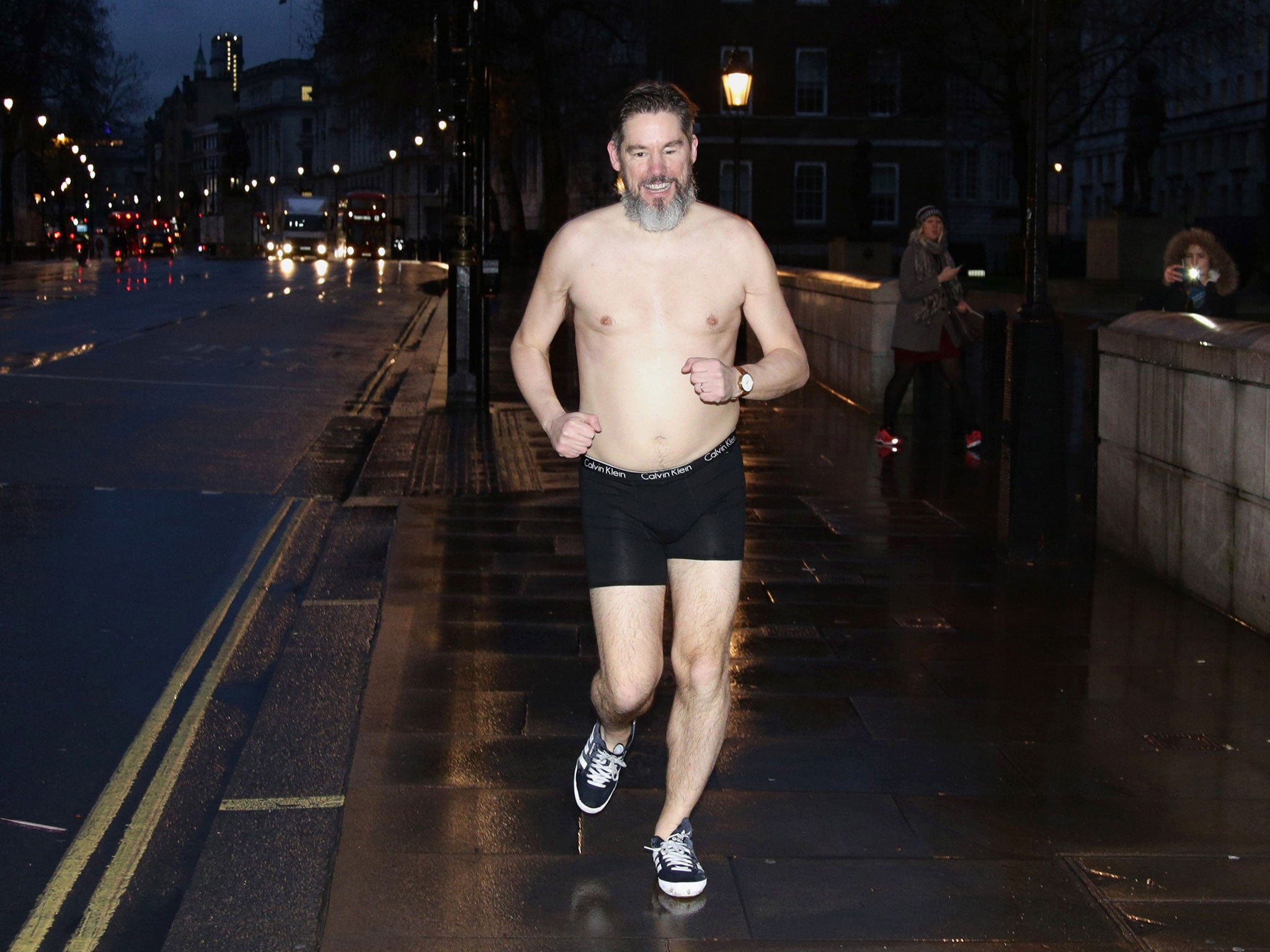 Daily Telegraph political journalist Dan Hodges streaks down Whitehall, London, after losing a bet for underestimating the Ukip's influence during the 2015 general election