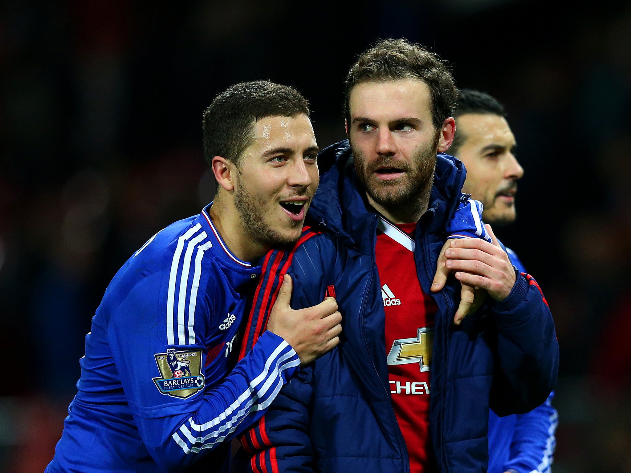 Eden Hazard with Manchester United's Juan Mata