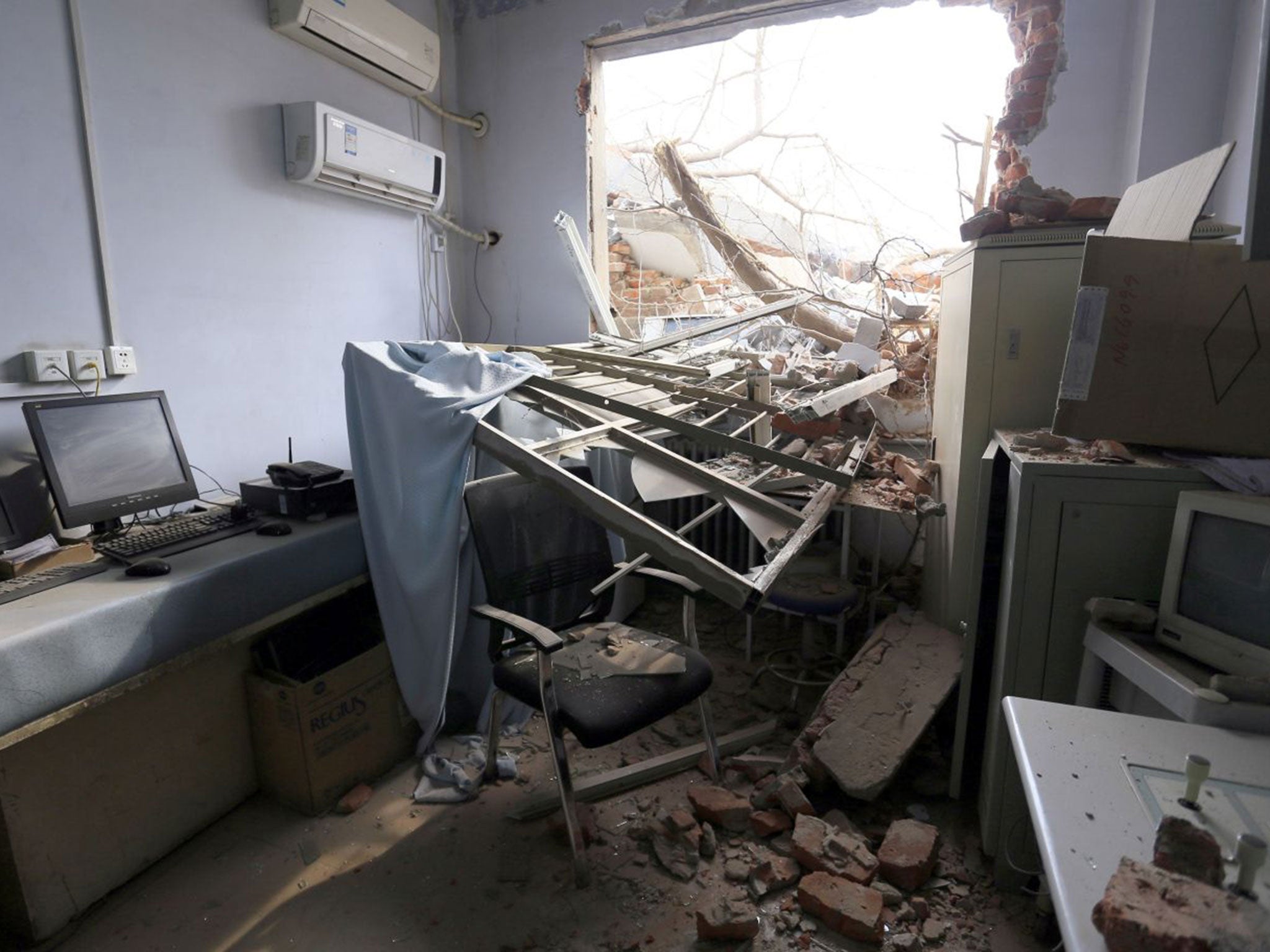 A photo from inside the hospital immediately after the bulldozers tore through the building, injuring staff members and crushing six bodies stored in the morgue