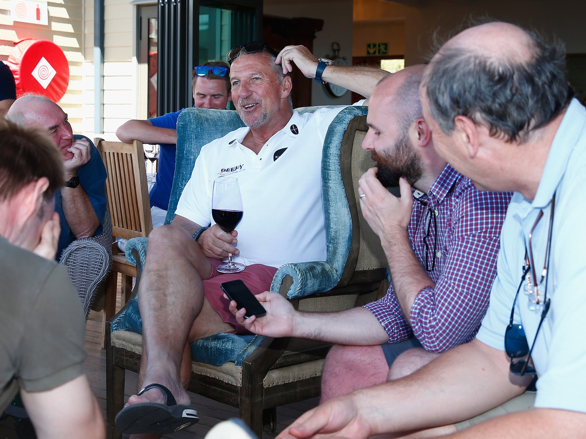 Sir Ian Botham holds court for the press yesterday