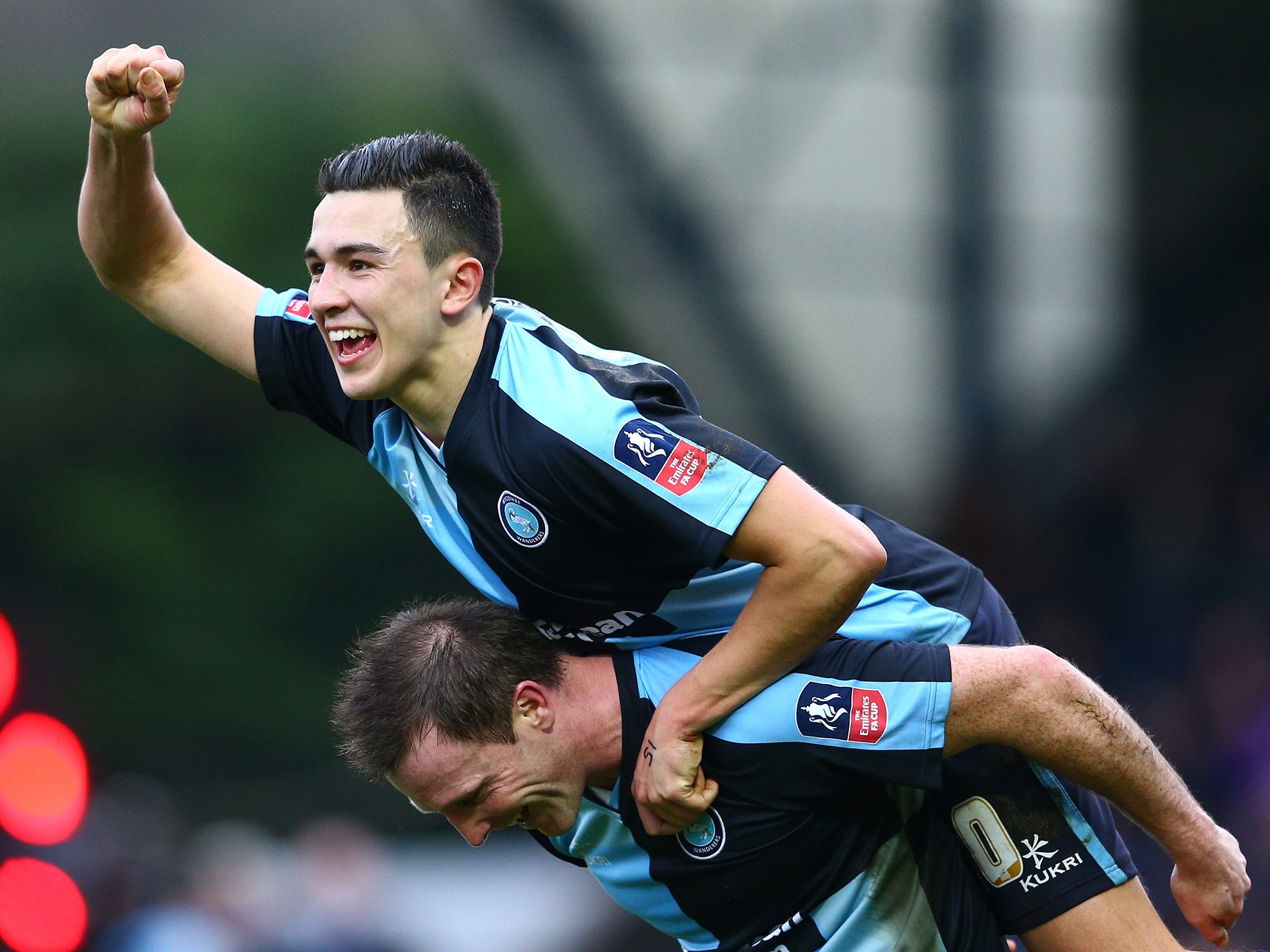 Garry Thompson (bottom) and Luke O'Nien (top) celebrate the 1-1 draw