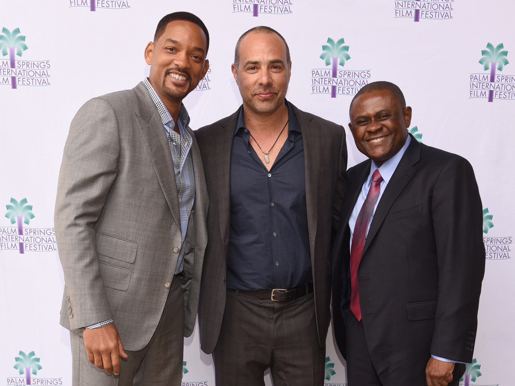 &#13;
Actor Will Smith, director Peter Landesman and Dr Bennet Omalu attend a screening of 'Concussion'&#13;