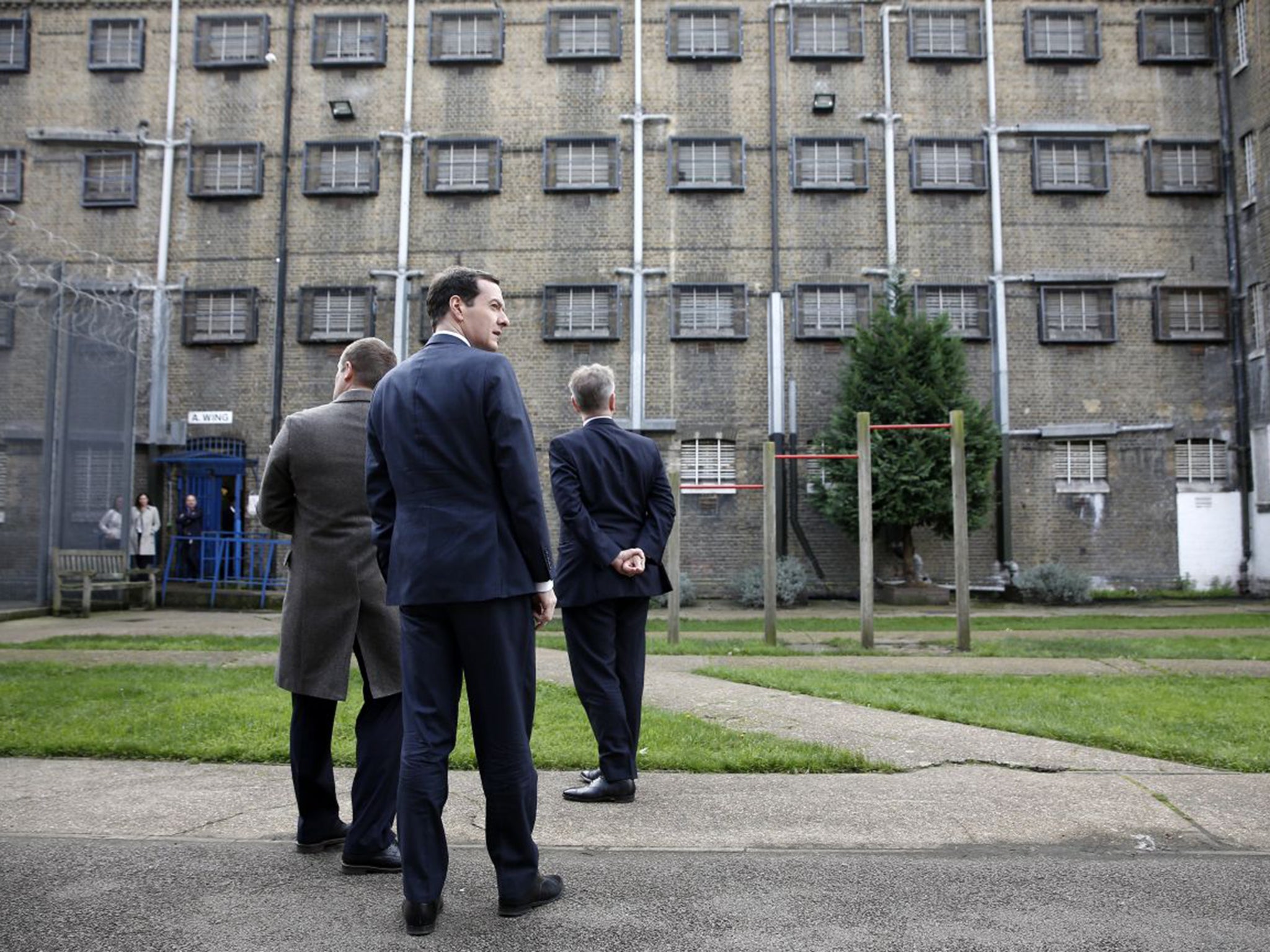 Michael Gove, right, and George Osborne, centre, toured Brixton Prison last year