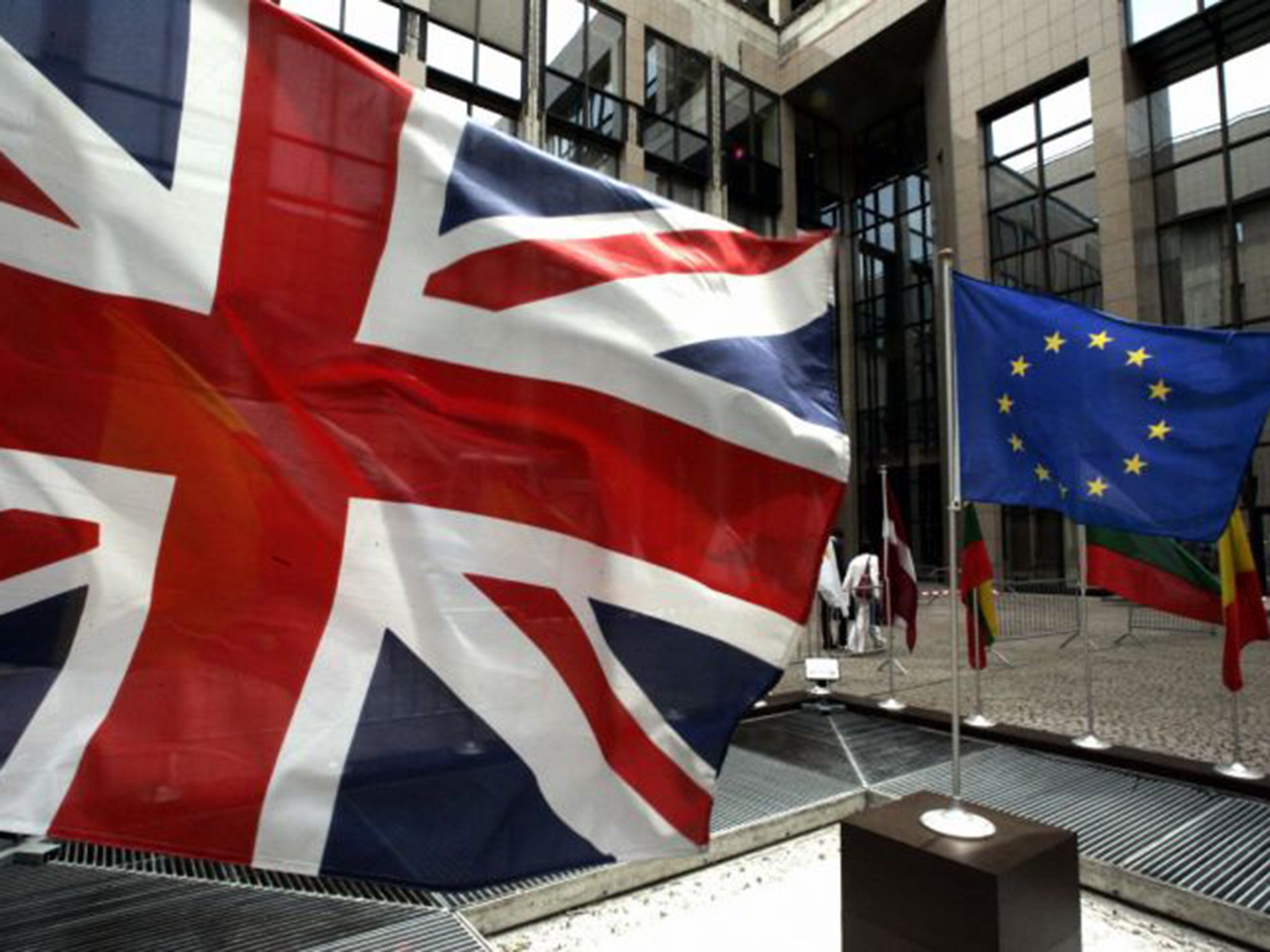 British and EU flags outside the organisation’s headquarters in Brussels