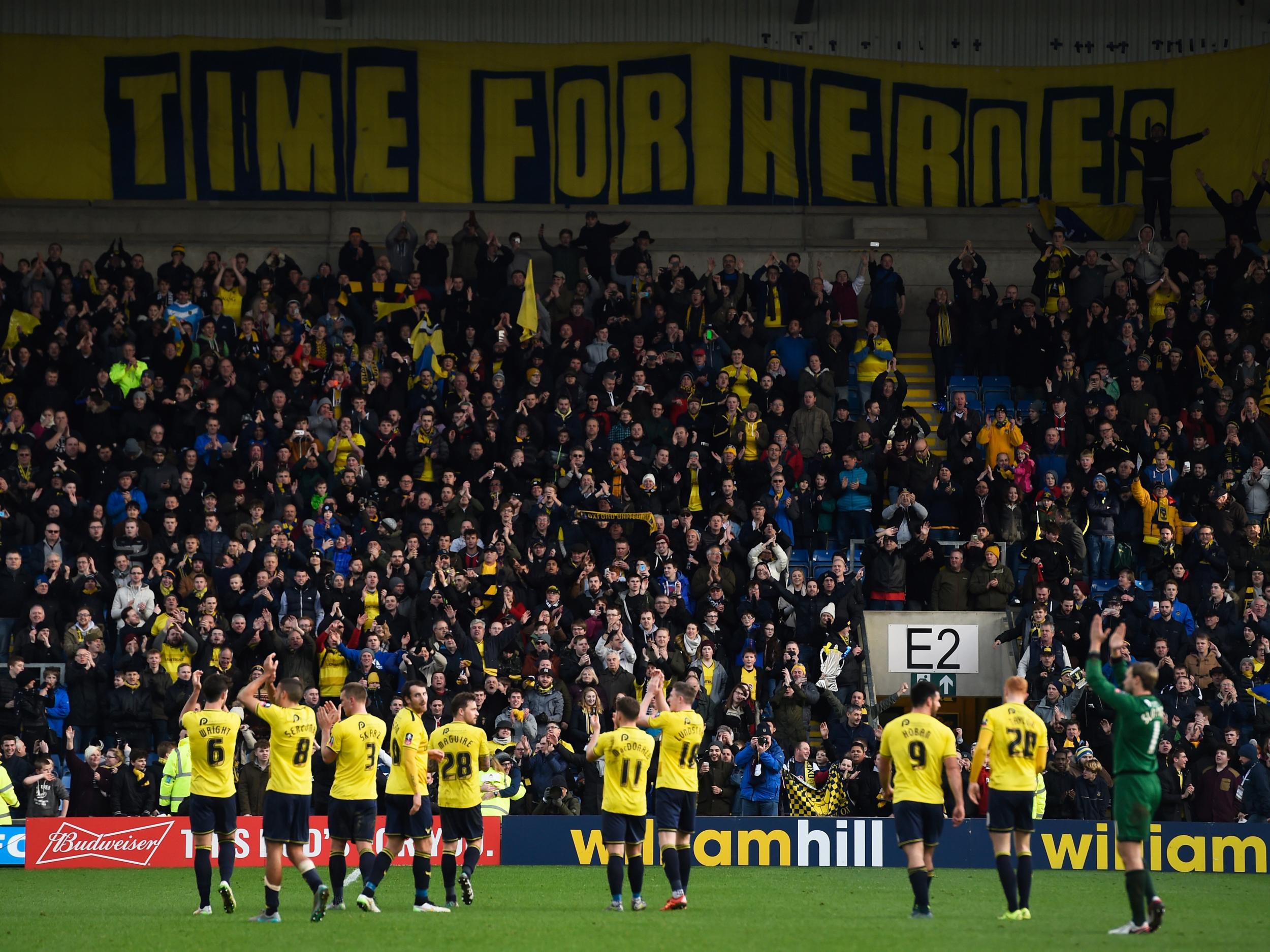 Oxford players celebrate after the final whistle