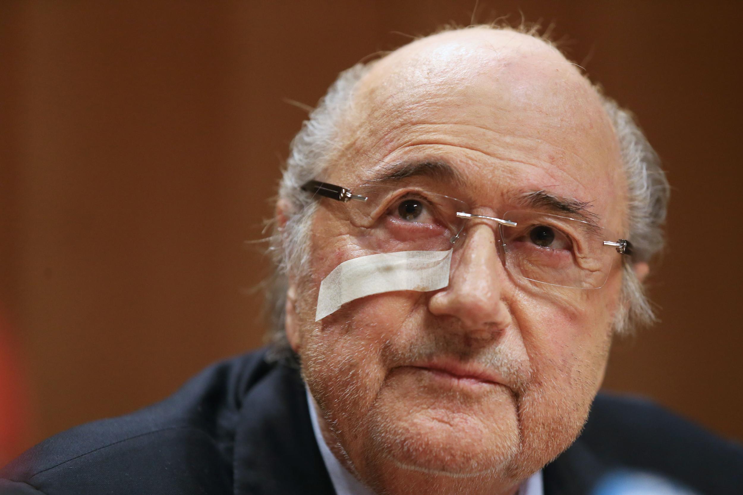 Sepp Blatter appears at a press conference after his ban