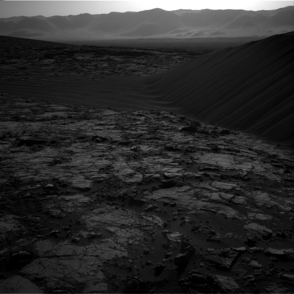 A dramatic picture taken by Curiosity shows the desolation of the Martian surface (Pic: Nasa)