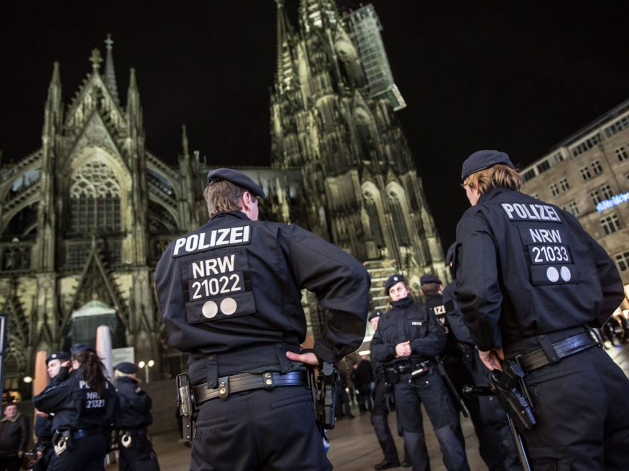 Police guard the area around the cathedral in Cologne after reports of attacks on men of North African or Arab appearance, in retaliation for the New Year’s Eve sex assaults