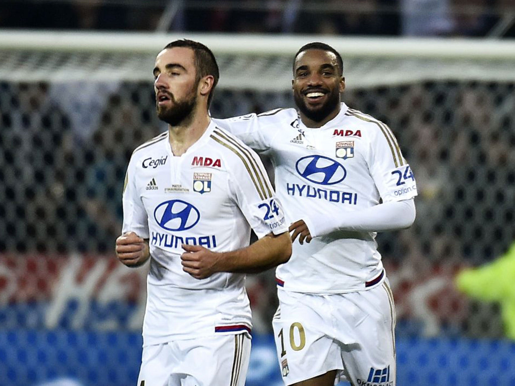 Alexandre Lacazette, right, has been strongly linked with a move from Lyon to Newcastle