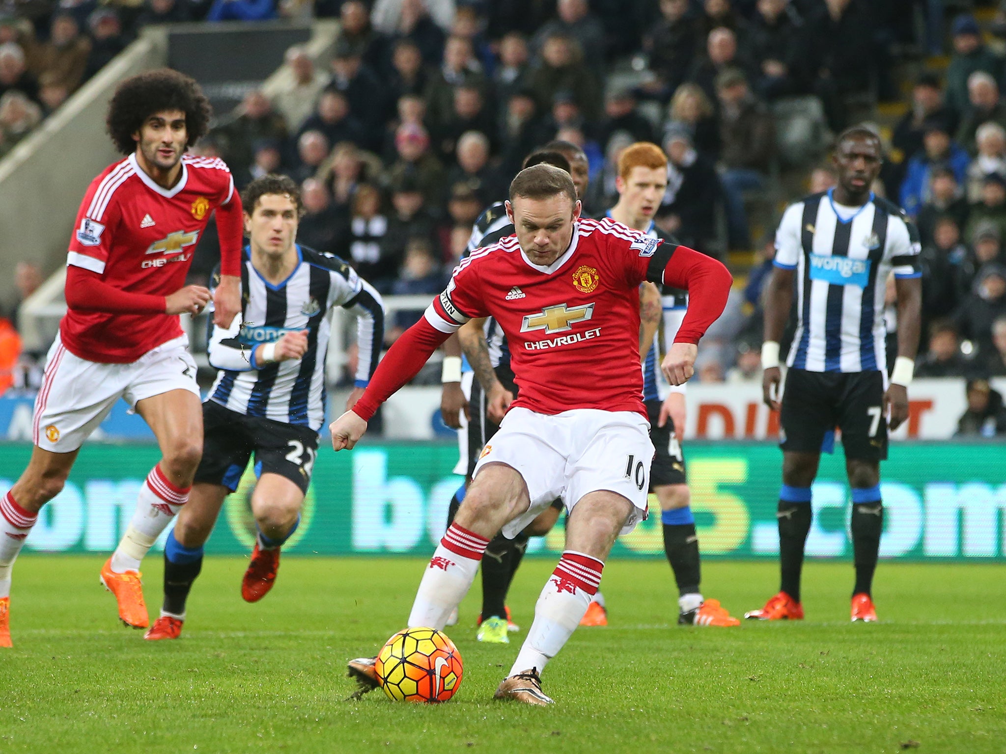 Manchester United striker Wayne Rooney dispatches his penalty