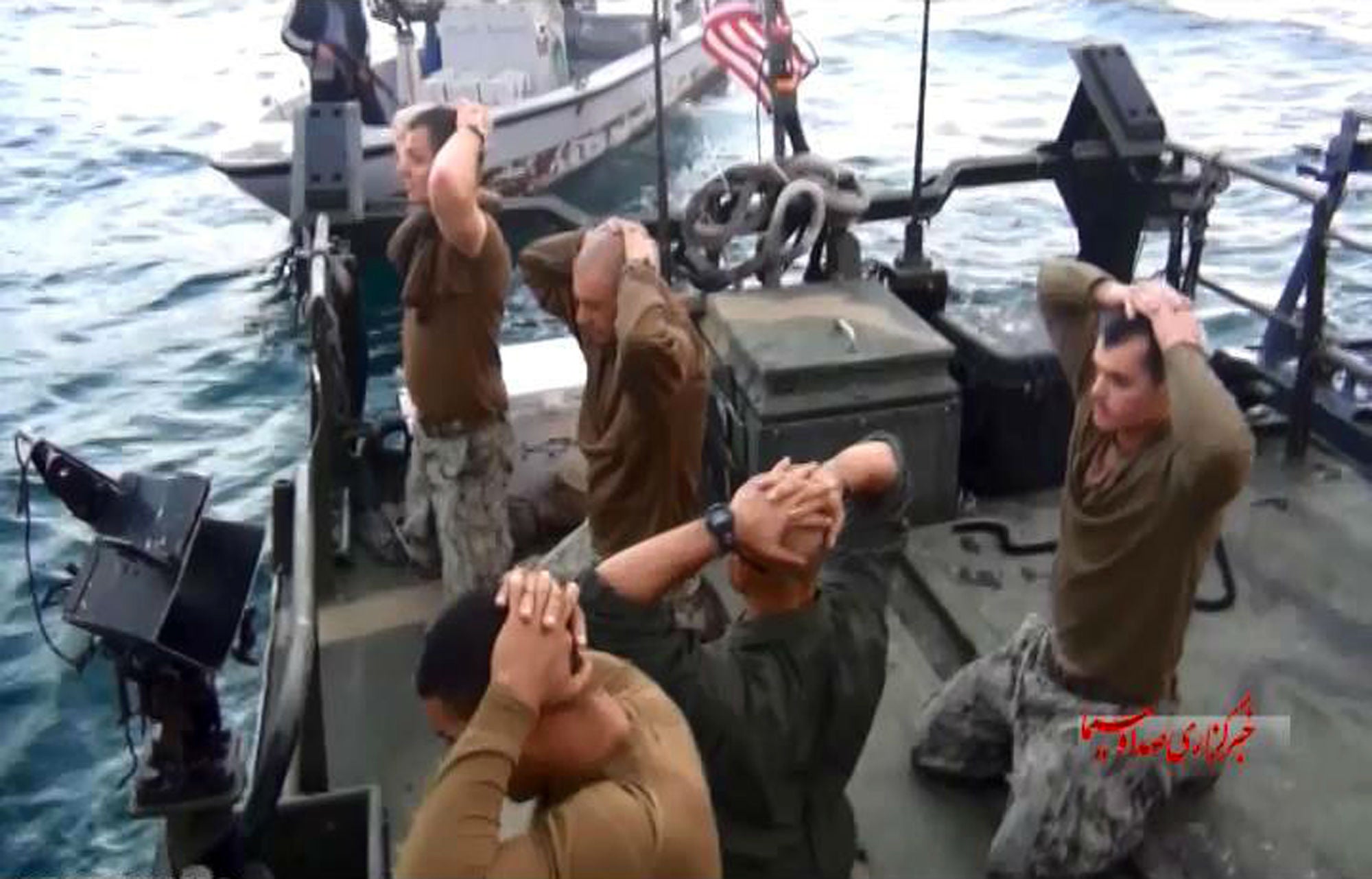 The footage showed the sailors with their hands on their heads