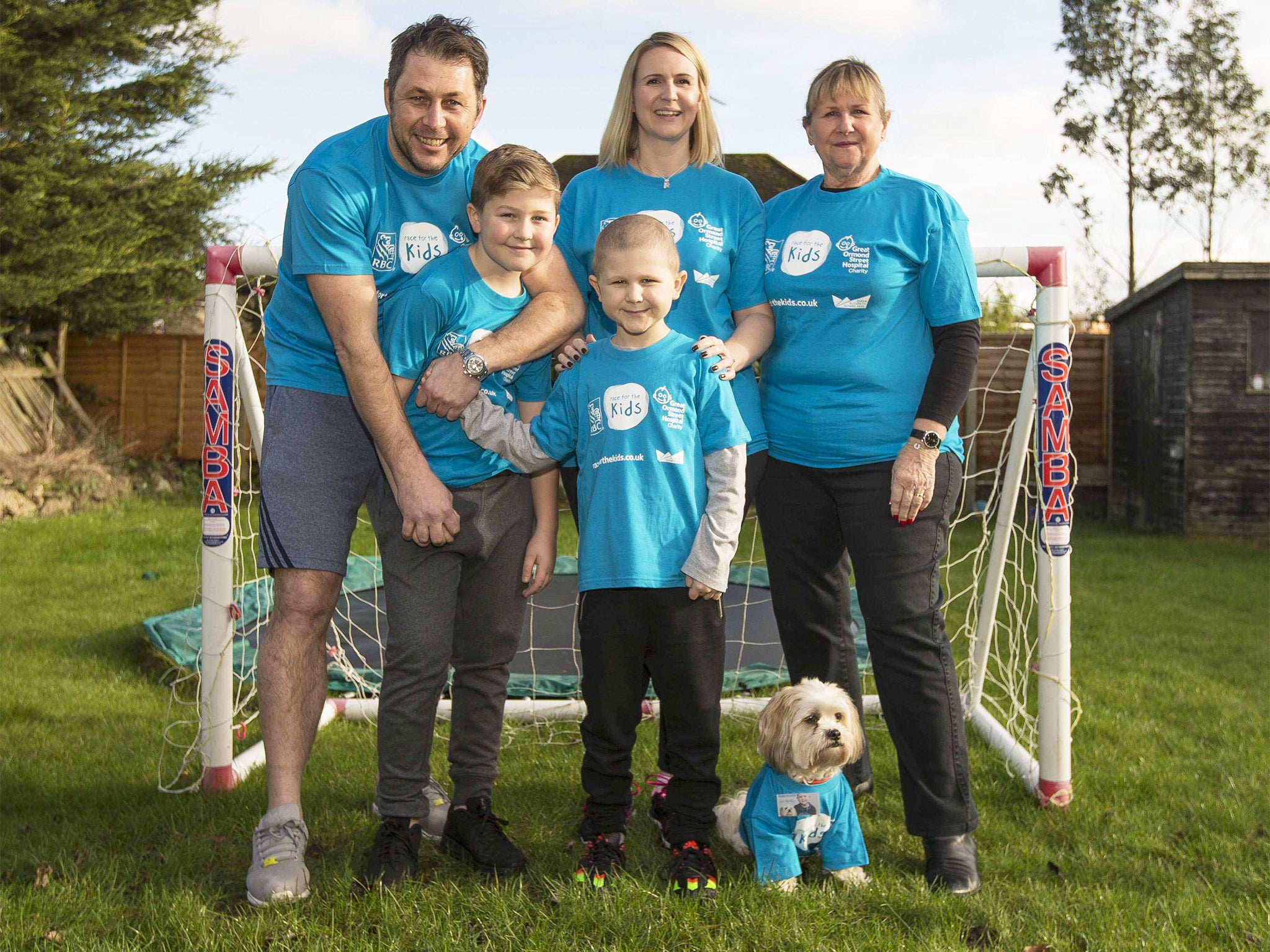 Rowan Pethard with his brother, Corey,10, parents Steve and Abby, grandmother, Sandra Brooke, and Rowan’s dog, Woody