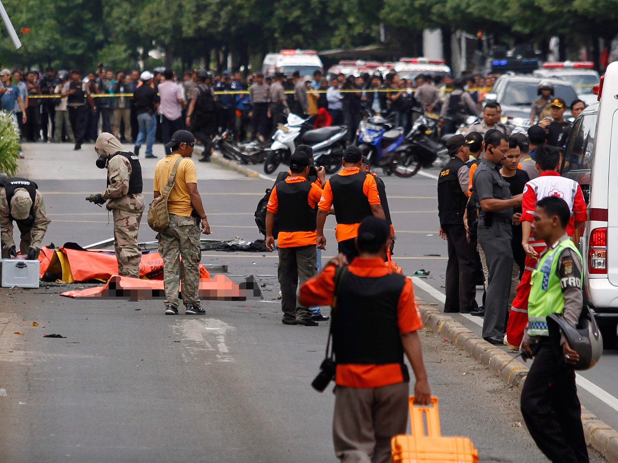 Emergency workers at the scene of the attack in Jakarta on 14 January 2016