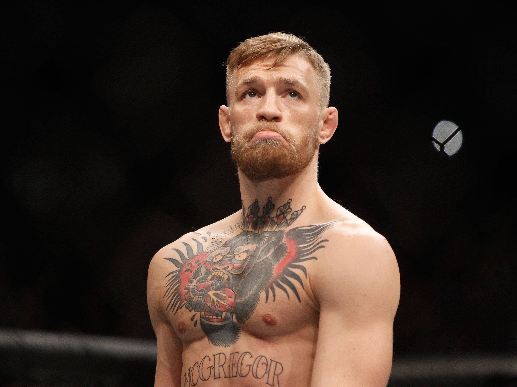 Conor McGregor reacts after knocking out Jose Aldo in 13 seconds