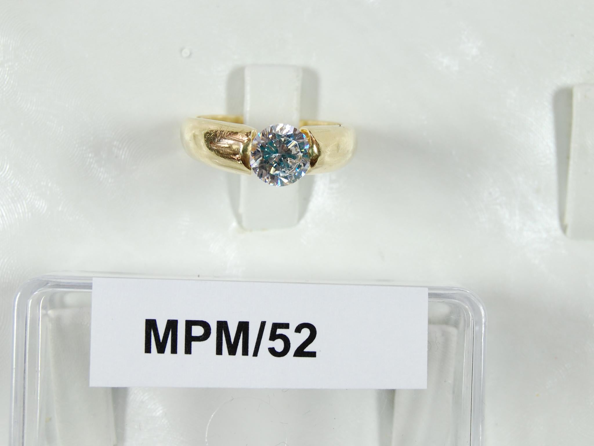 Diamond ring found in wardrobe in front bedroom at Heene