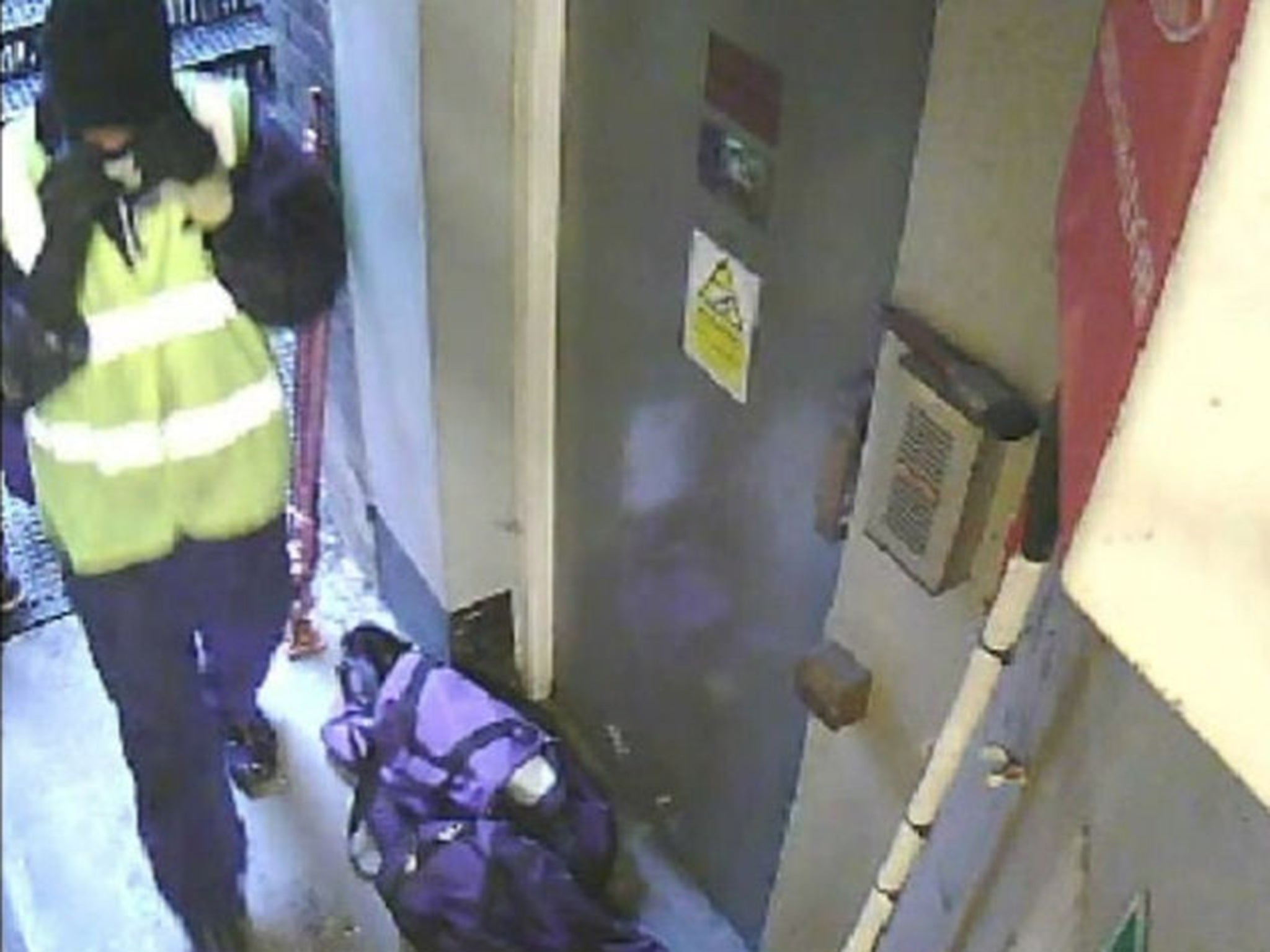 Still image of 'Male F' in the fire escape corridor on 3 April 2015