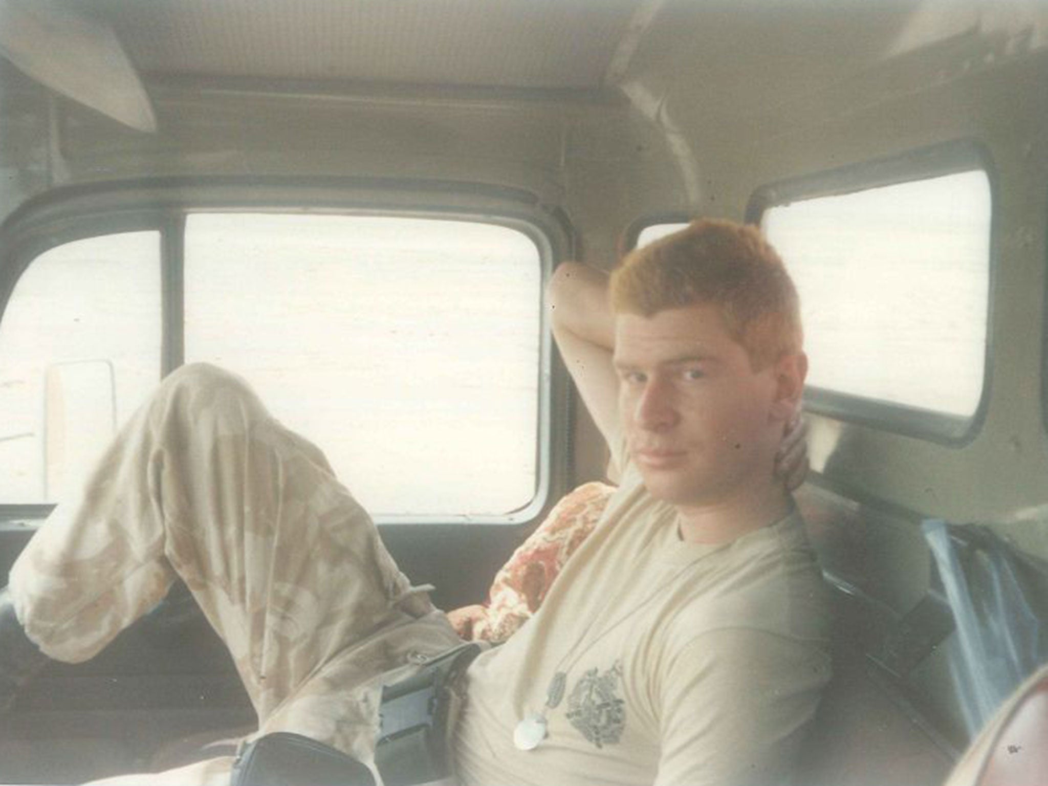 On guard: Wright snapped on escort duty, transporting ammunition across the Kuwaiti desert