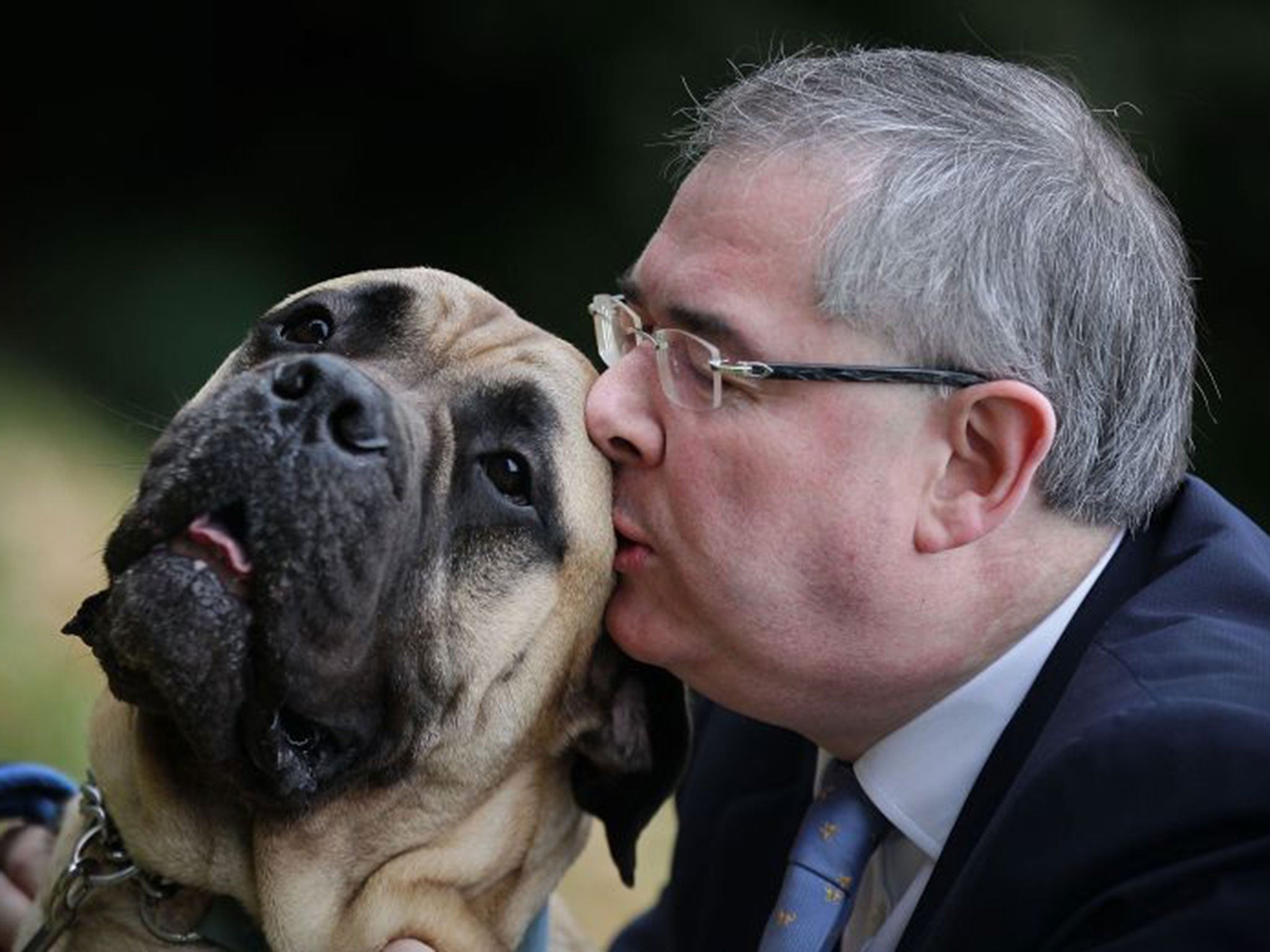 Barrister Geoffrey Cox, with his dog George, hoped to reclaim £4.99 for weedkiller