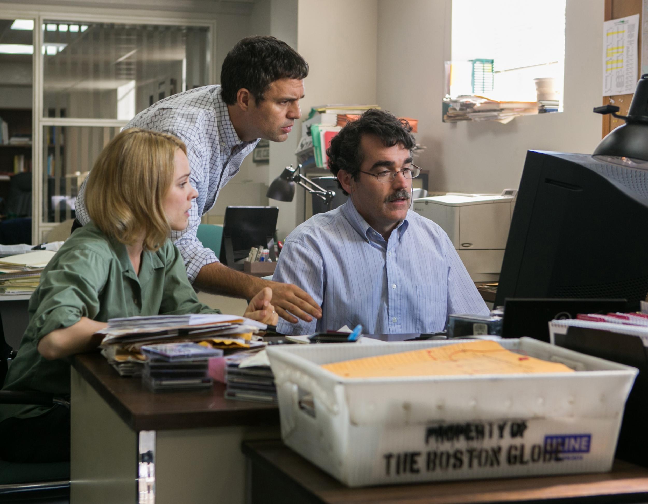 Rachel McAdams as Sacha Pfeiffer, Mark Ruffalo as Michael Rezendes and Brian díArcy James as Matt Carroll in Spotlight