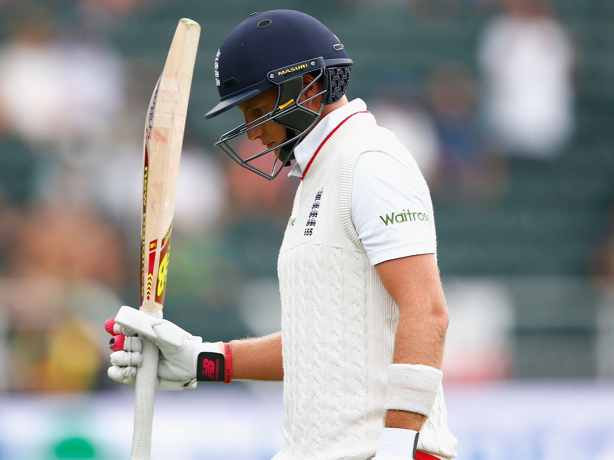 Joe Root walks off the pitch after adding just four runs to his overnight score of 102