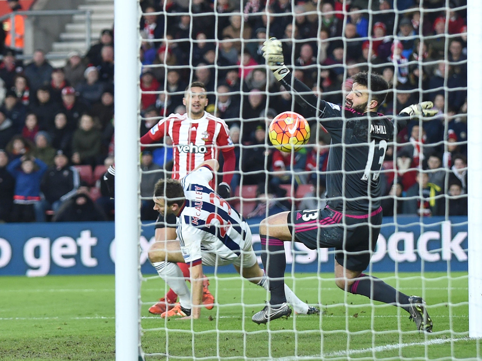 Dusan Tadic watches his shot beat West Brom goalkeeper Boaz Myhill