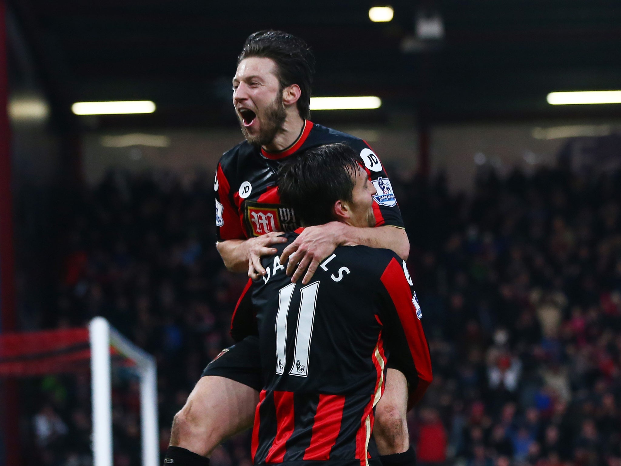 Charlie Daniels celebrates scoring from the penalty spot