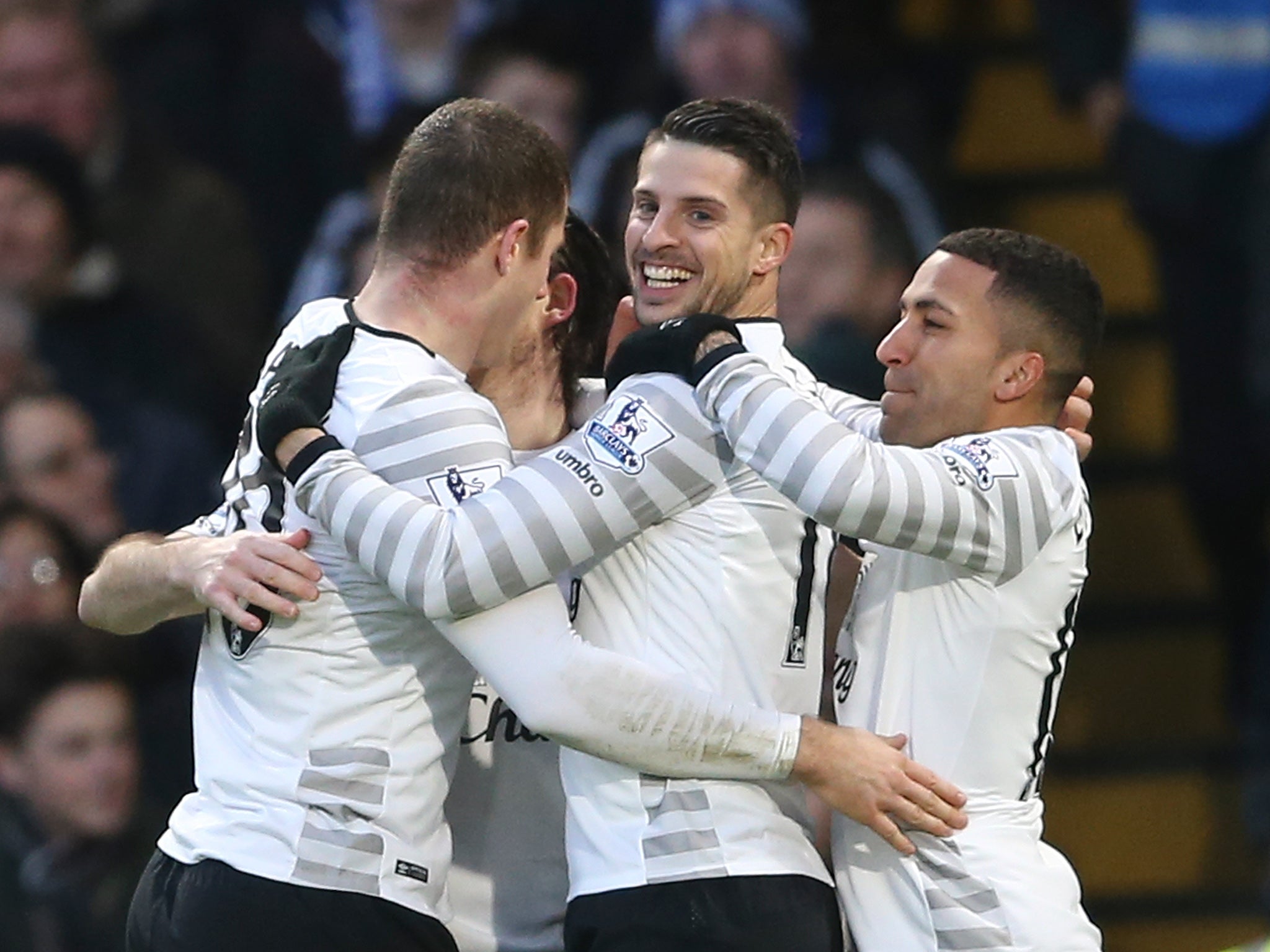 Kevin Mirallas celebrates his goal with his Everton team-mates